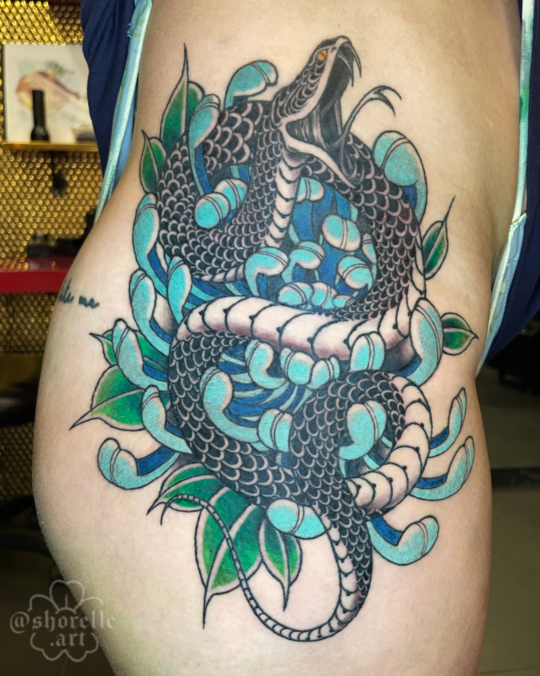 snake-chrysanthemum-hip-tattoo.png