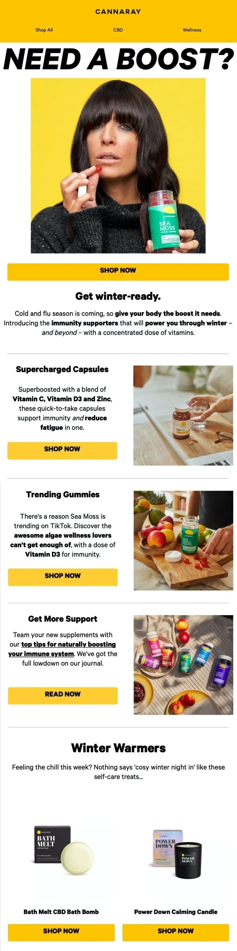 An advertisement for wellness products featuring a woman with black hair and bangs holding a bottle labeled 'Sea Moss' and a capsule, with sections promoting supplements like supercharged capsules, trending gummies, and winter warmers like bath bombs
