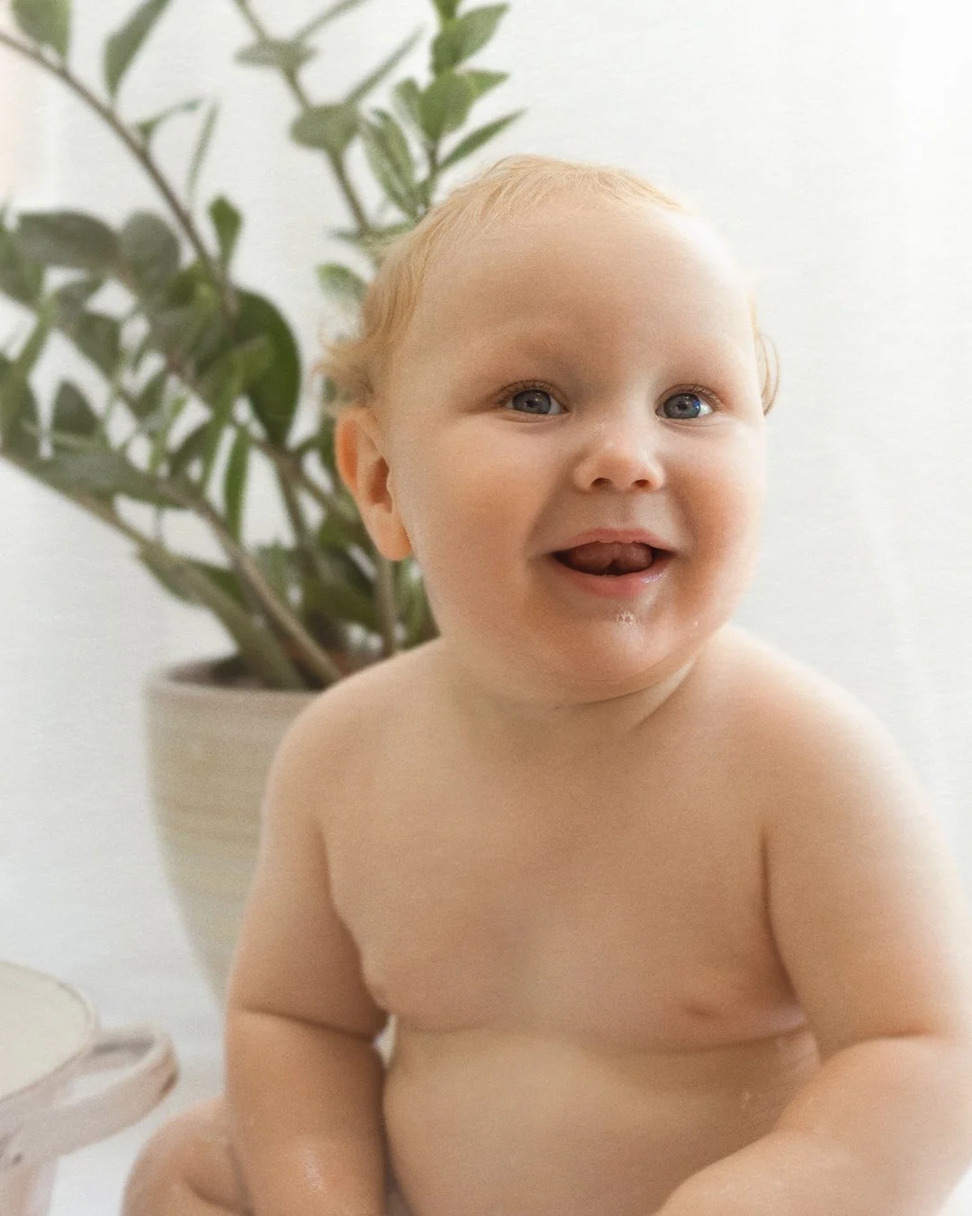 He&rsquo;d much rather be outside, crawling through the grass and splashing in puddles&hellip;
but for five quiet minutes, we sat him here by the window.
And that&rsquo;s when this happened.

The biggest grin, tiny teeth showing, and a little line of