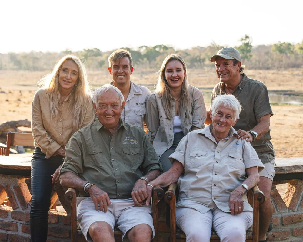 The Stead family together beside a river in Zimbabwe