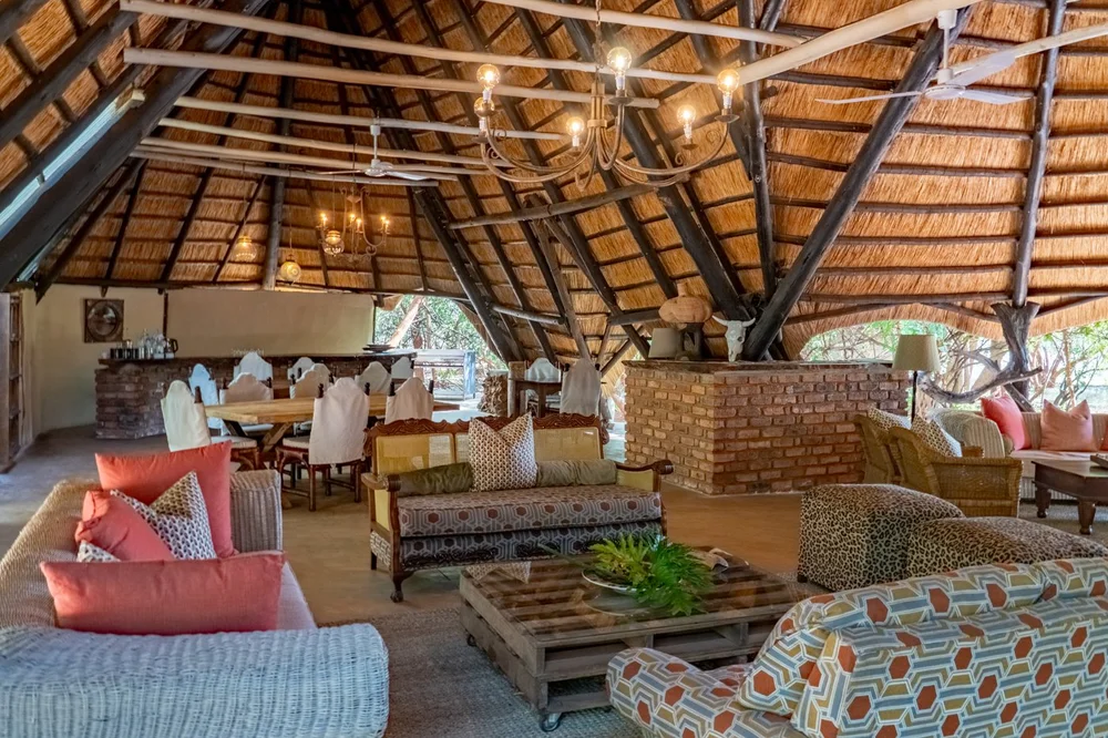 The thatched main lounge at Ivory Lodge