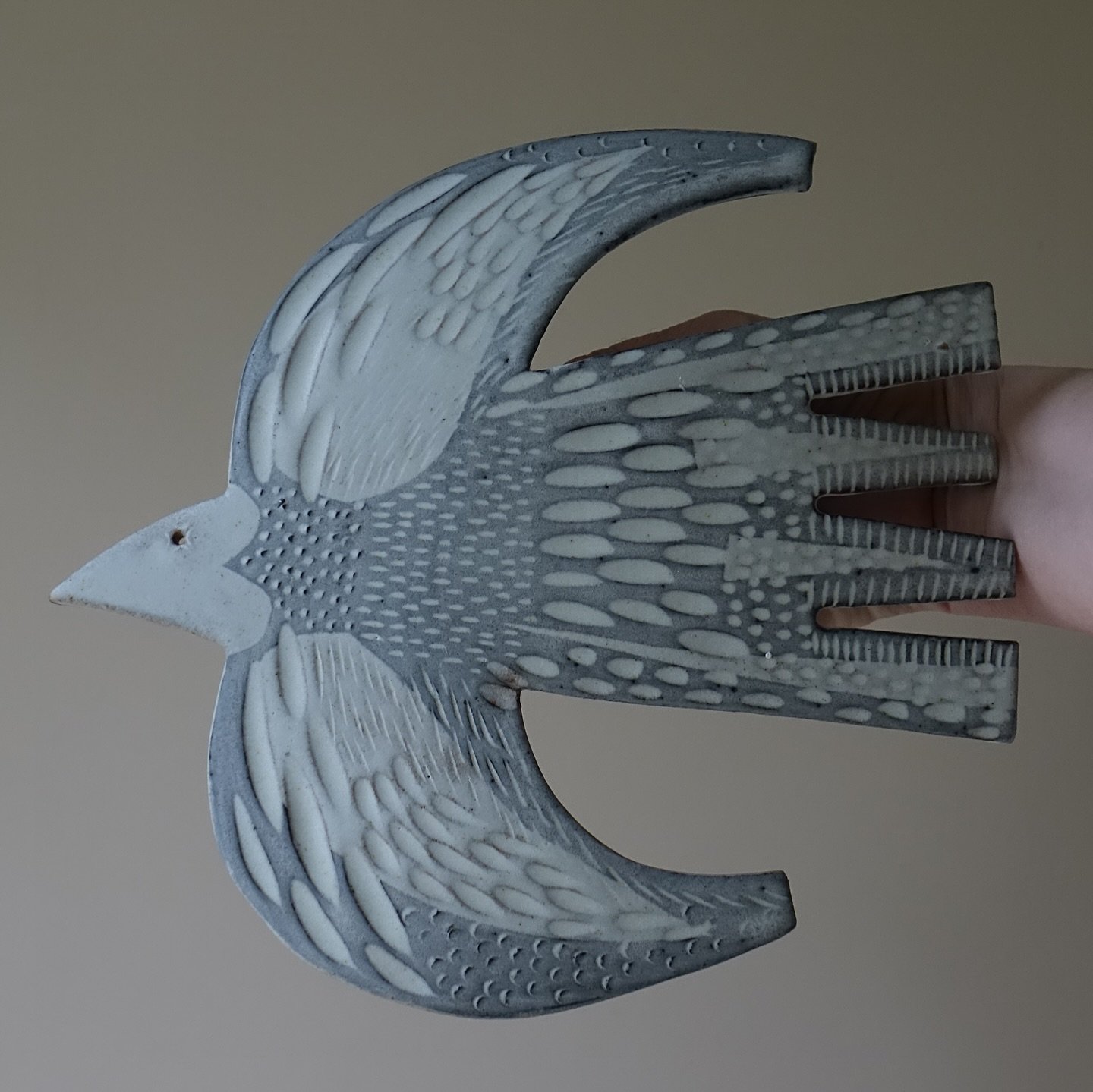 Introducing a new addition to my wall hangings: 
&lsquo;Migrating Bird&rsquo; 2025
I&rsquo;m really pleased with how these emerged from my kiln - the black slip, carvings and textures turned out as well as I&rsquo;d hoped. I hope you like them too.
I