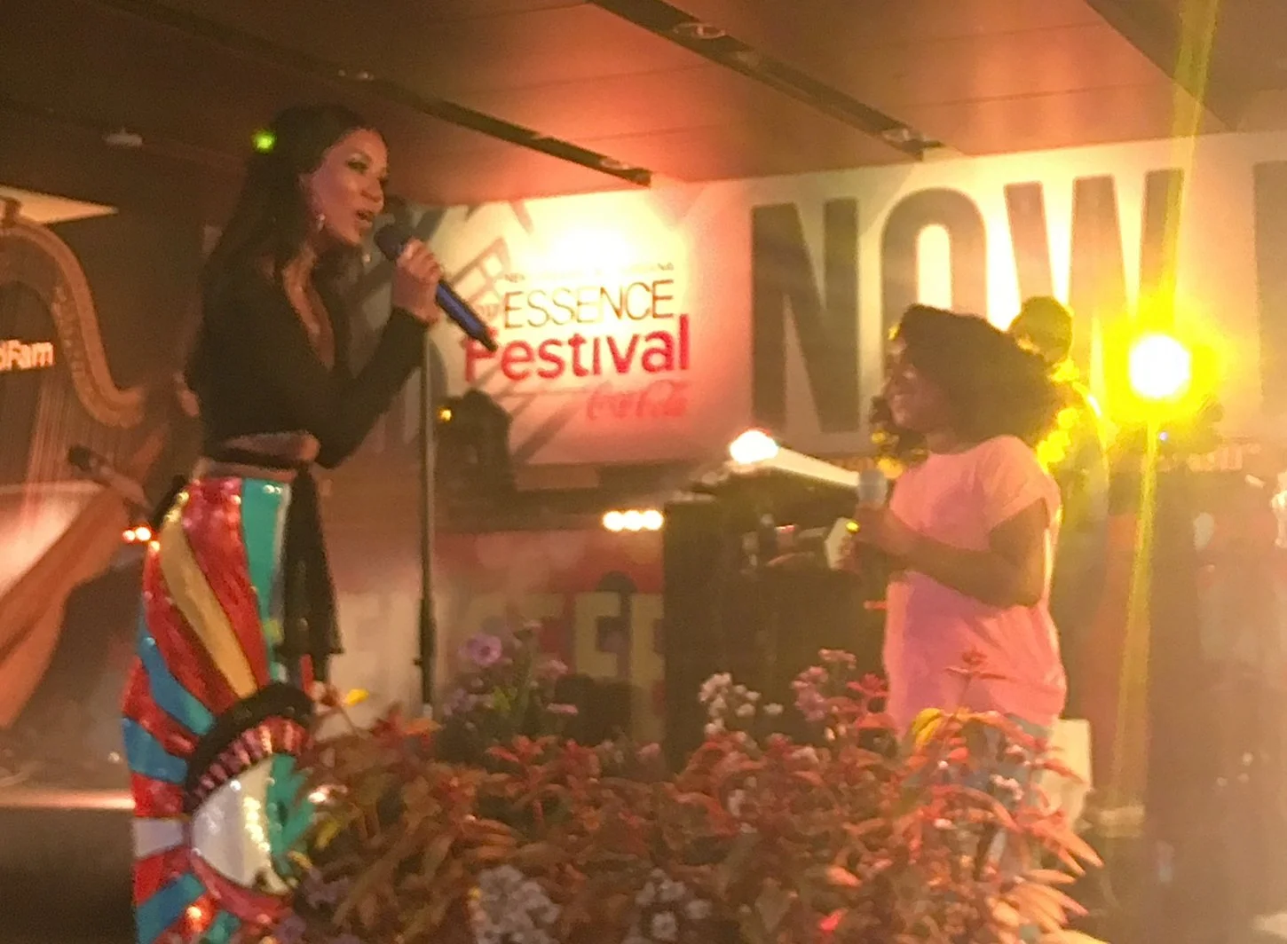 Jhene Aiko and daughter Nami performing at Essence Fest 2017