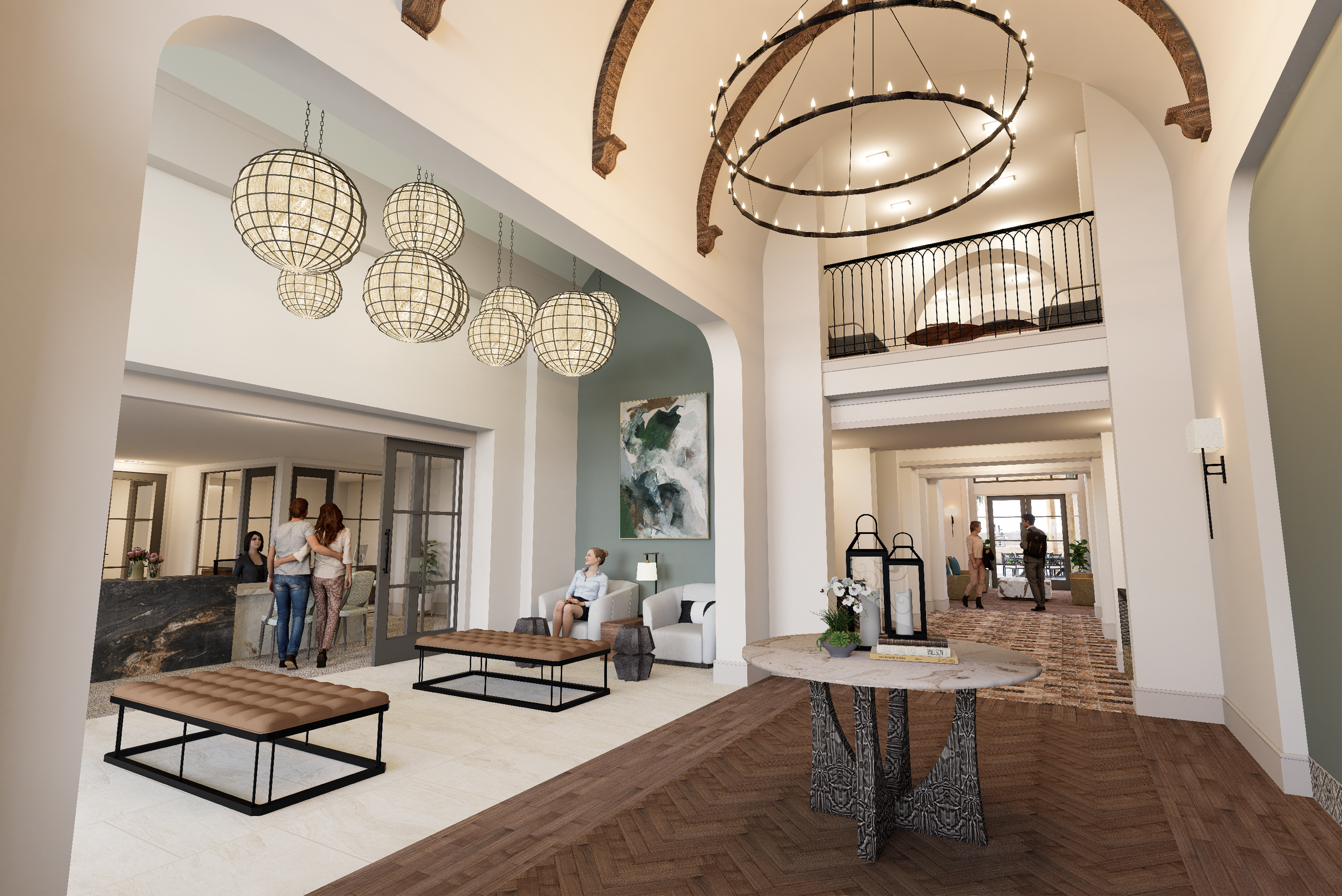 Interior of a hotel lobby with high ceilings, decorative lighting fixtures, and a seating area with white chairs and artwork on the wall. There are people mingling near the reception desk and conversing in the background.