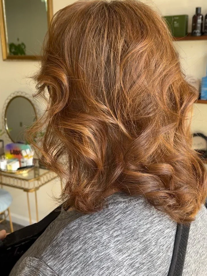 We completely transformed our guest with a dimensional auburn balayage. We can&rsquo;t stop thinking about this lower maintenance and an easy lived-in look. Swipe to see the before. 👀 cut and color by @michellerhogan