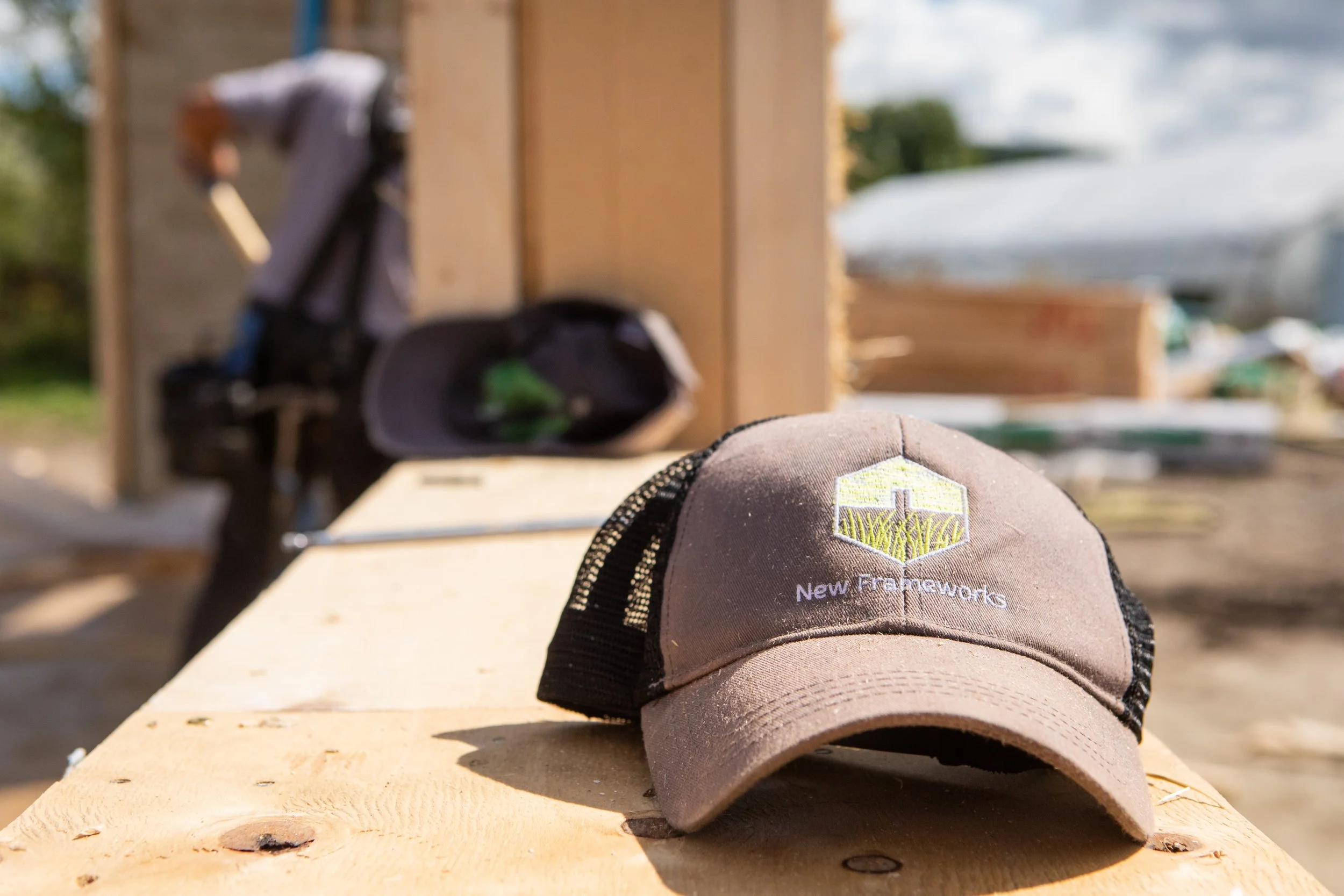 new frameworks hat resting on straw bale panel
