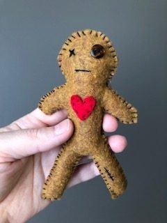 Voodoo-Doll-in-hand-rotated.jpg