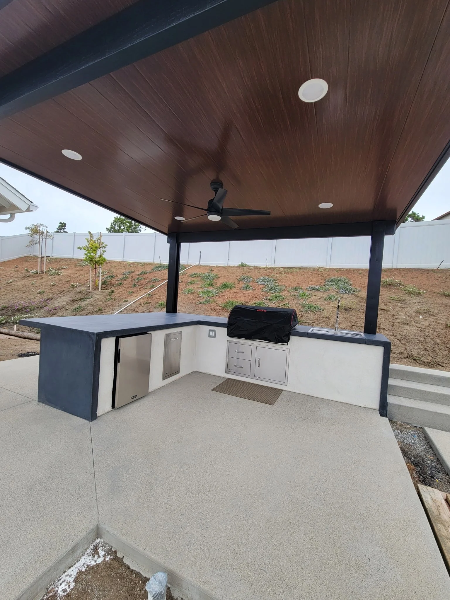 Beautiful custom outdoor kitchen installation designed for entertaining and elevating backyard living spaces.