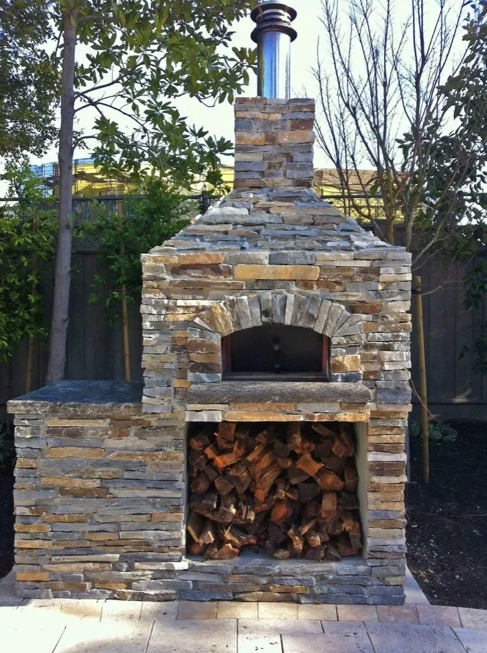 Custom outdoor fire pit and fireplace installation in San Marcos, Vista, Oceanside, Carlsbad, La Jolla, Encinitas and  Fallbrook by experienced family-owned hardscape company.