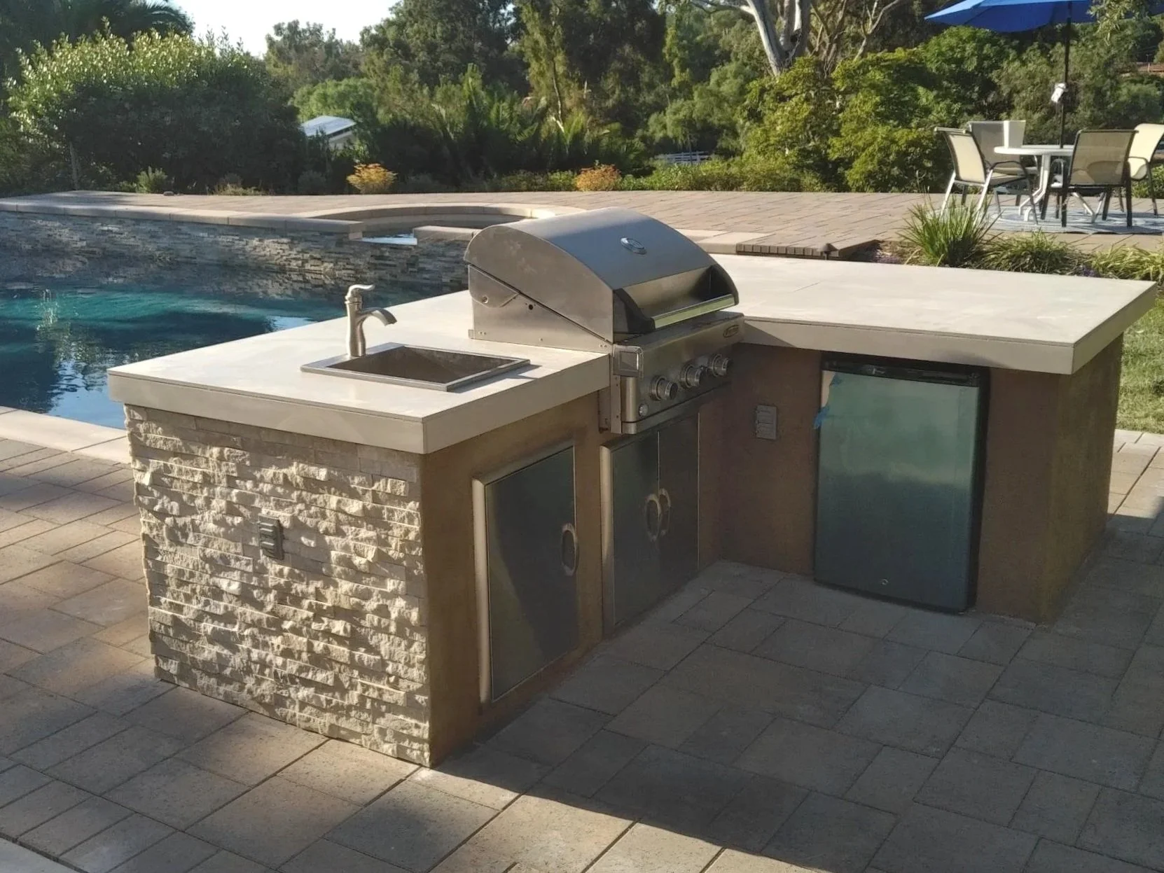 Custom outdoor BBQ and grill installation in San Diego backyard – durable hardscape design for cooking and entertaining.