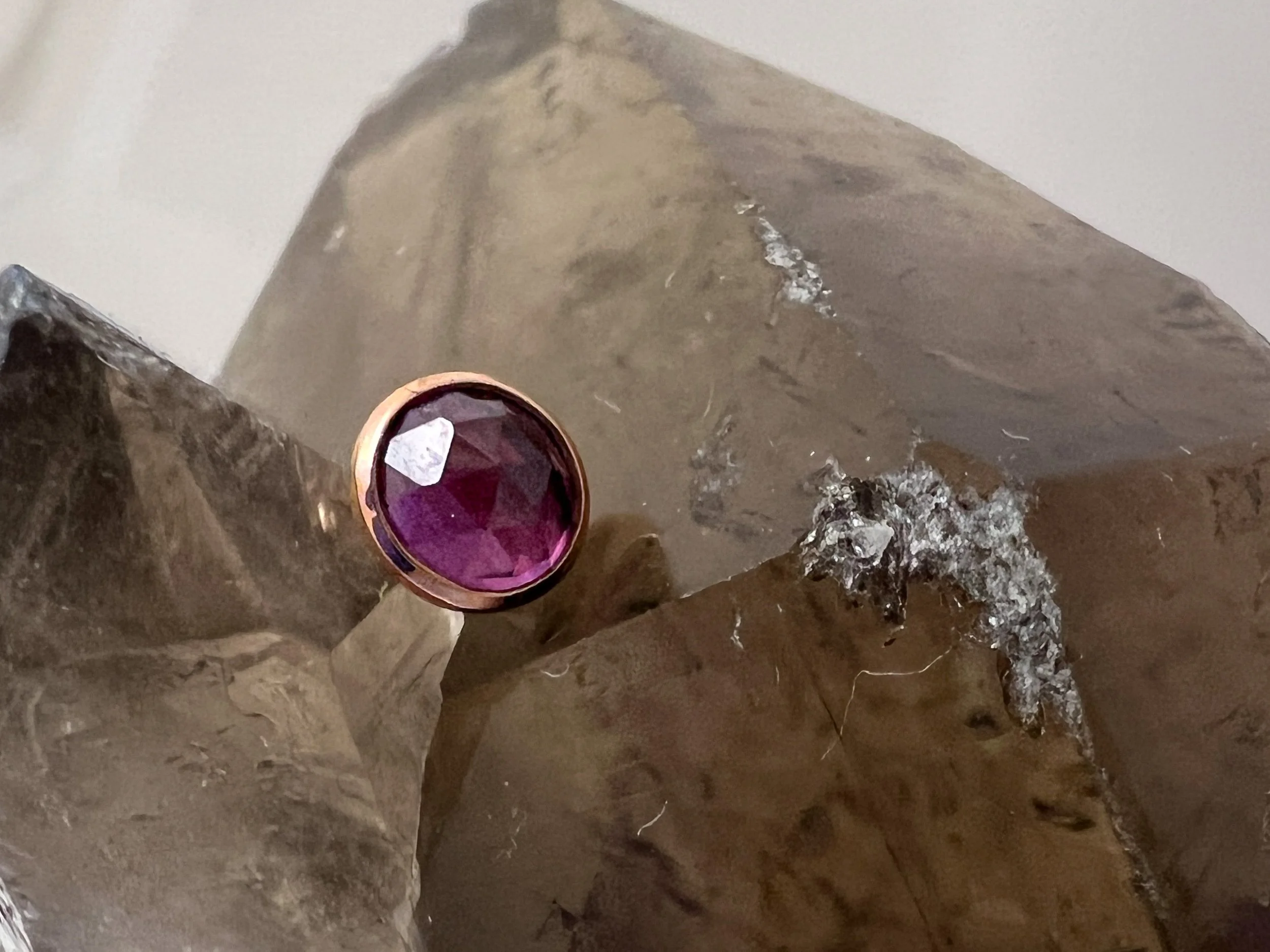 Rhodolite Garnet has a pink-ish purple tone — giving it a rich berry color. 