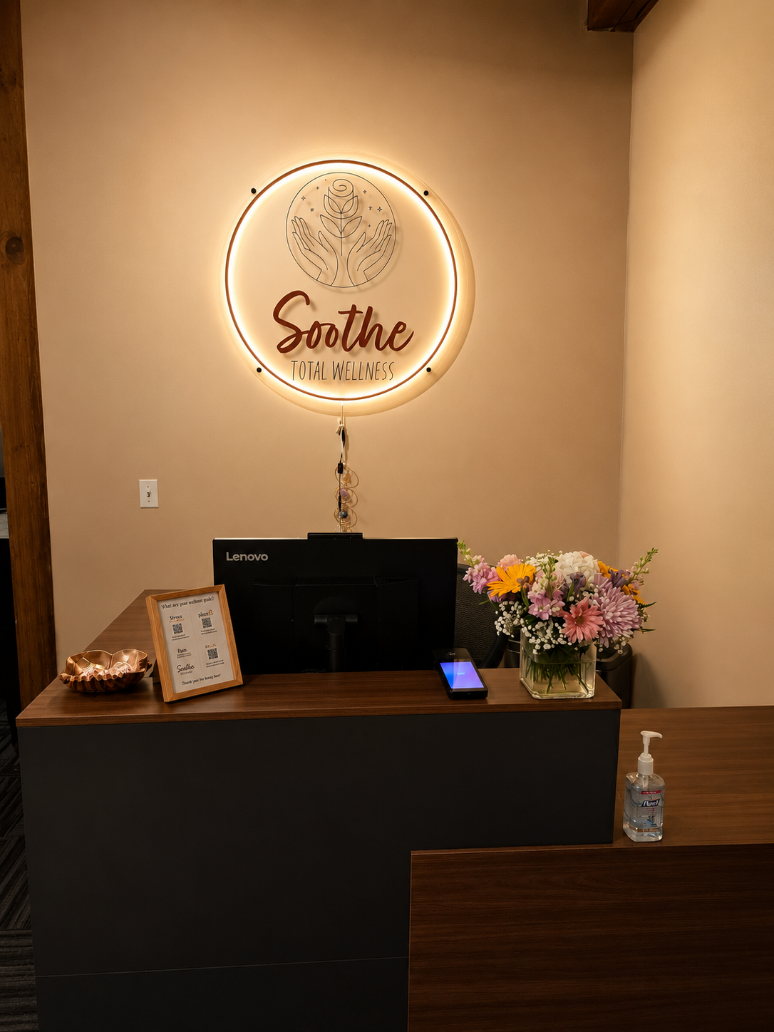 The front desk at Soothe Total Wellness. A beautiful bouquet of flowers giving off a wonderful aroma.