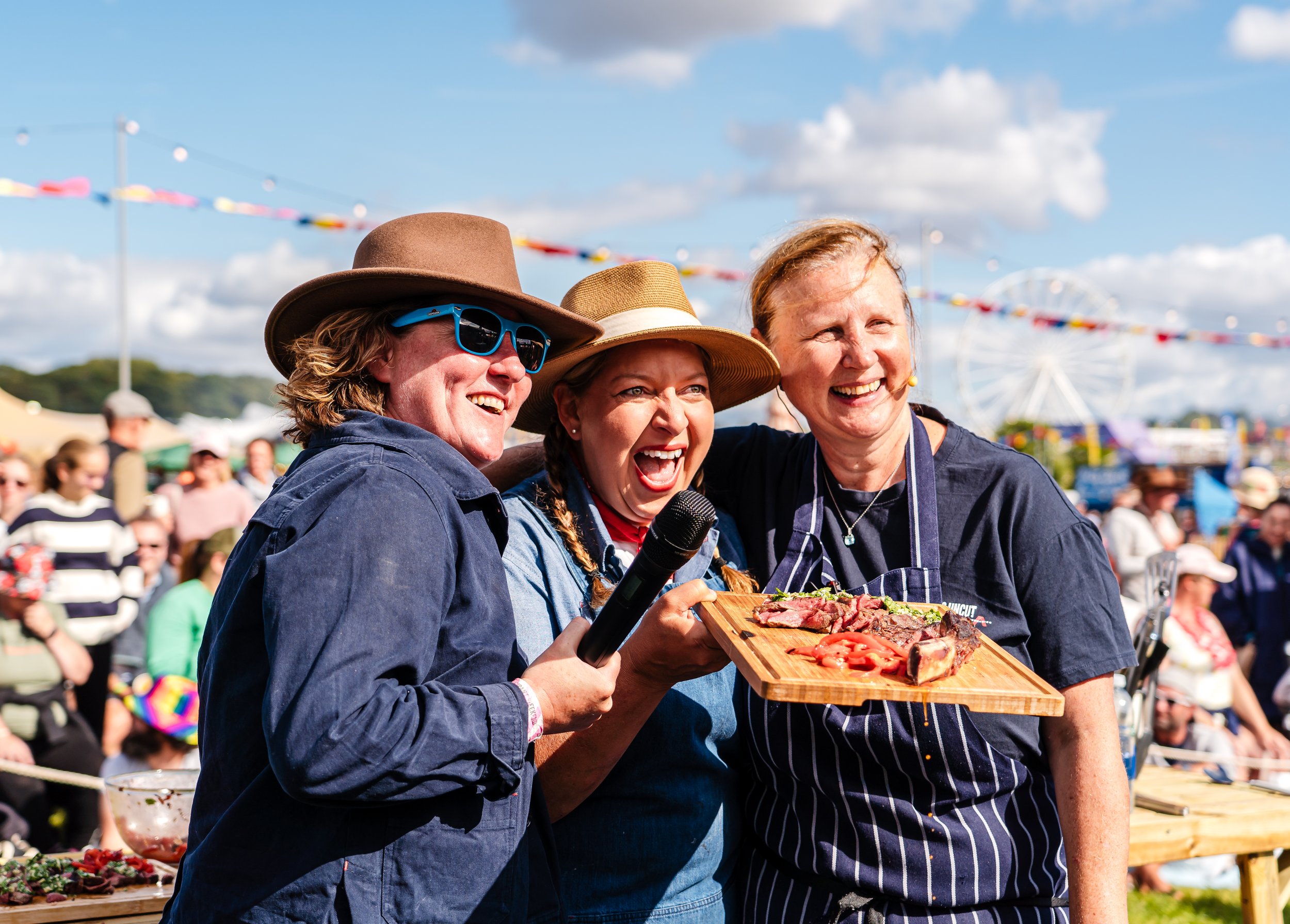 20230827_Josh_B_Sunday_FoodFest_BBQCookoutChefAndHostsPresentingFood.jpg