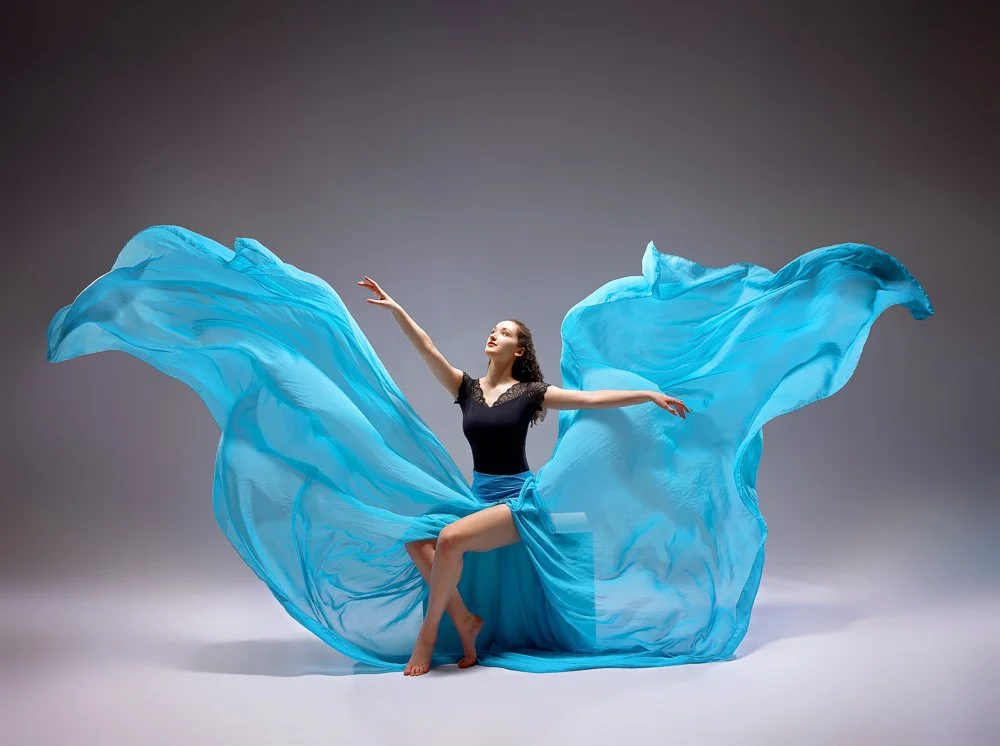   Expressive fabric dance photography capturing motion and shape  