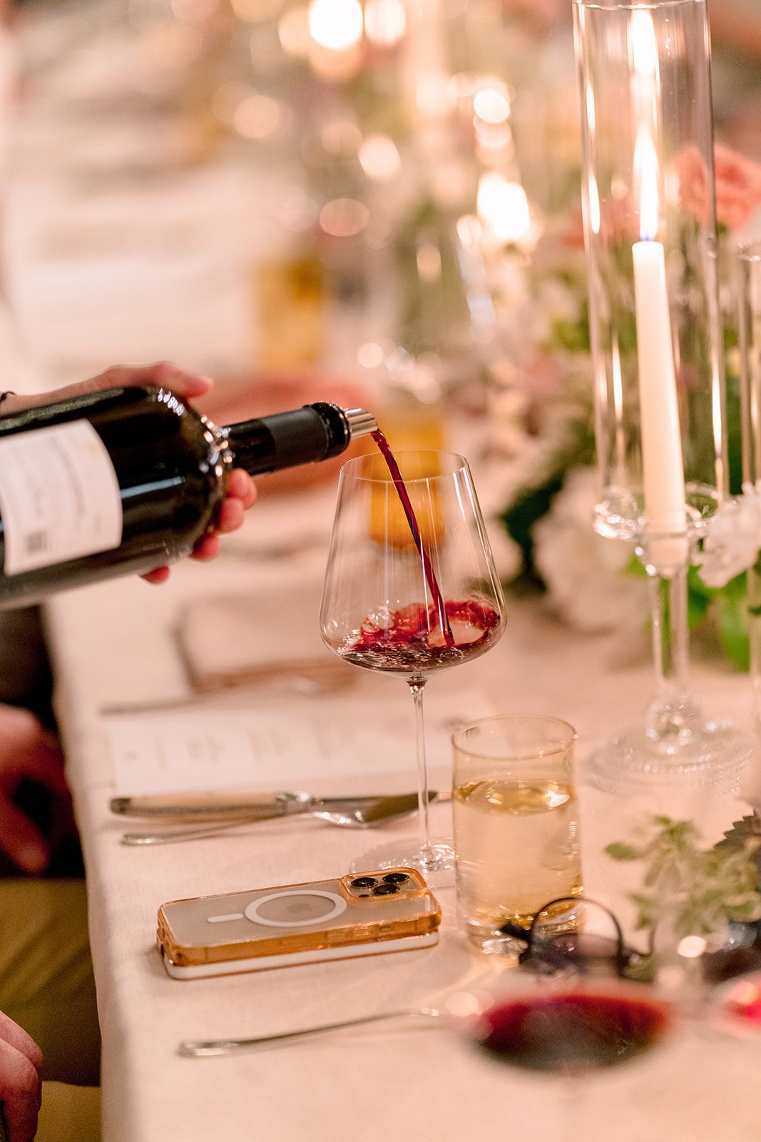 Elegant corporate gala dinner with wine service, organized by a professional event planner in Switzerland.