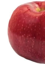 Red apple with a smooth surface and small water droplets