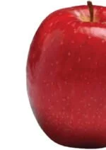 Close-up of a red apple with a small leaf on top