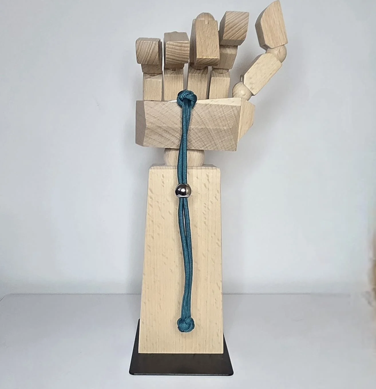 teal wrist strap.jpeg