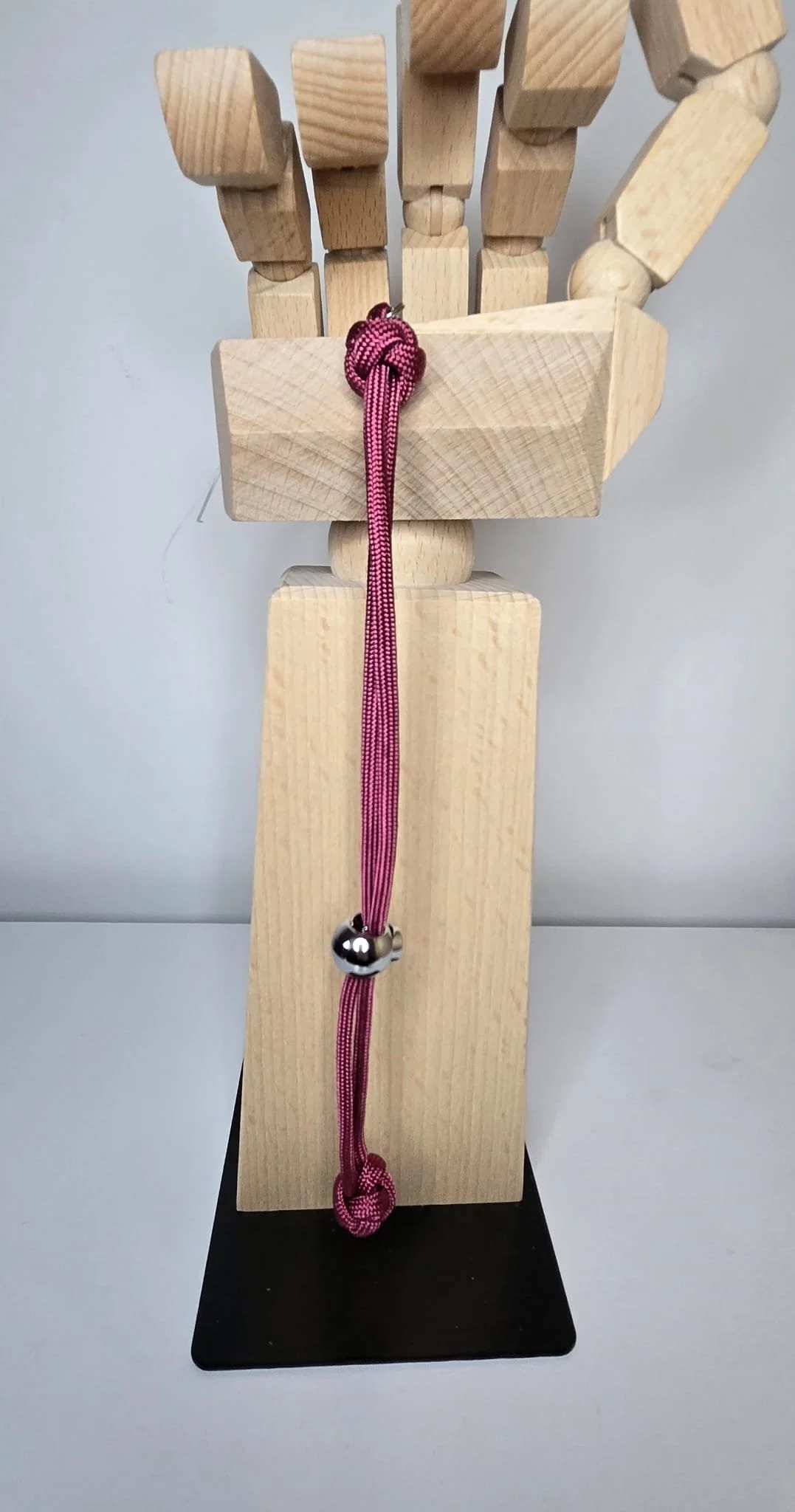 pink wrist strap.jpeg