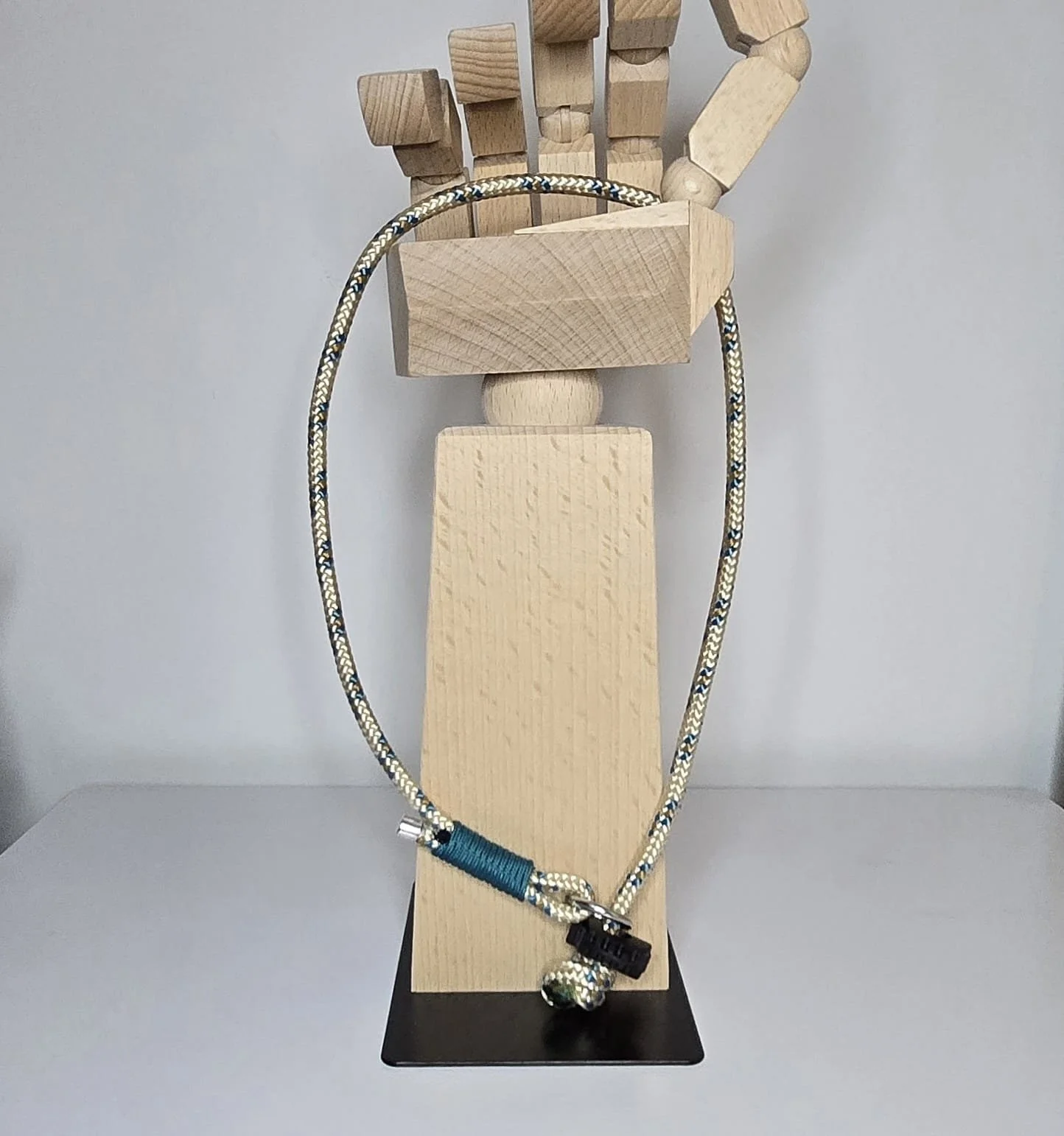 cream teal grot with knot grab.jpeg