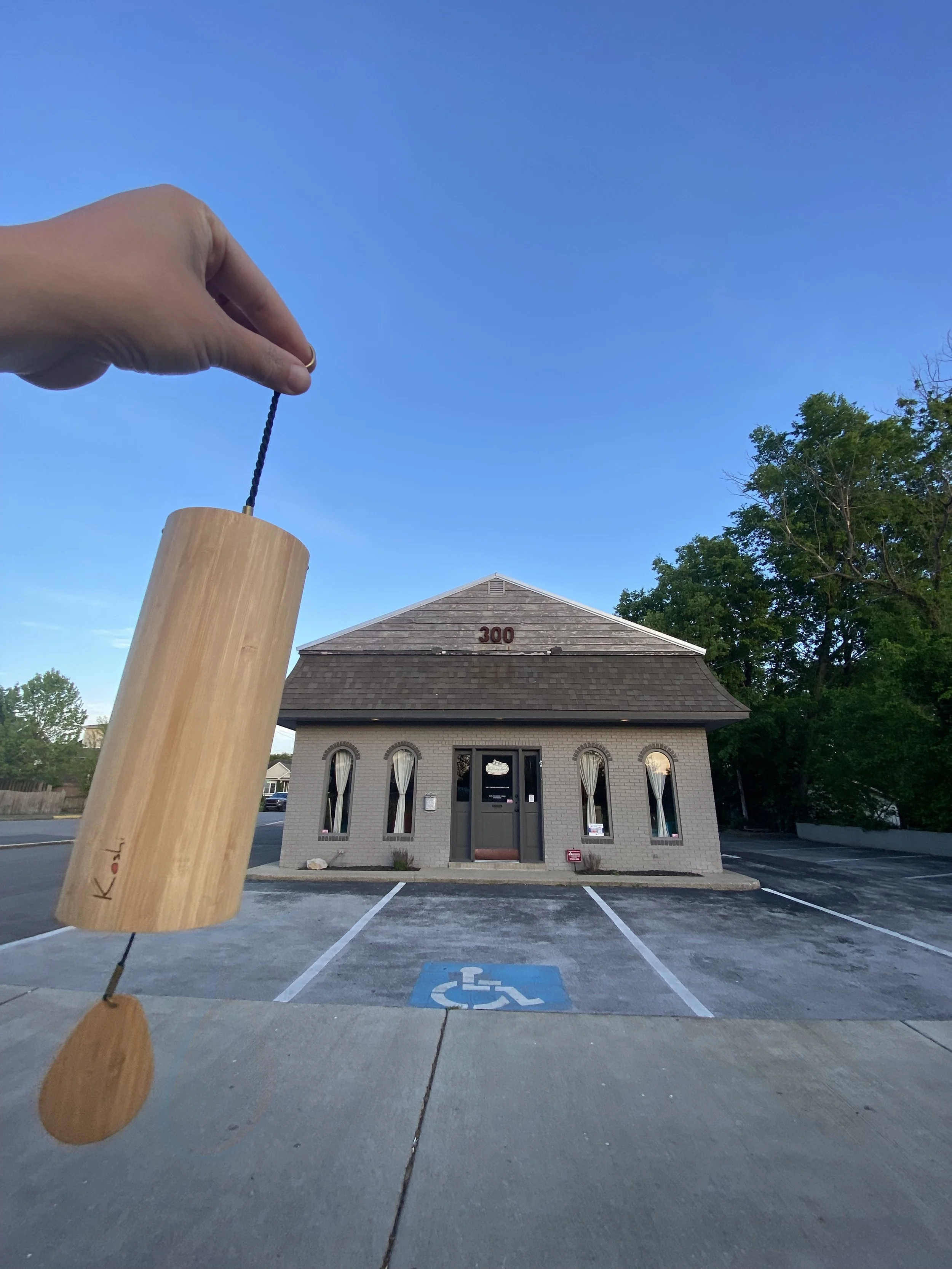 A Koshi Chime rings outside the Healing Spirit on College Street.