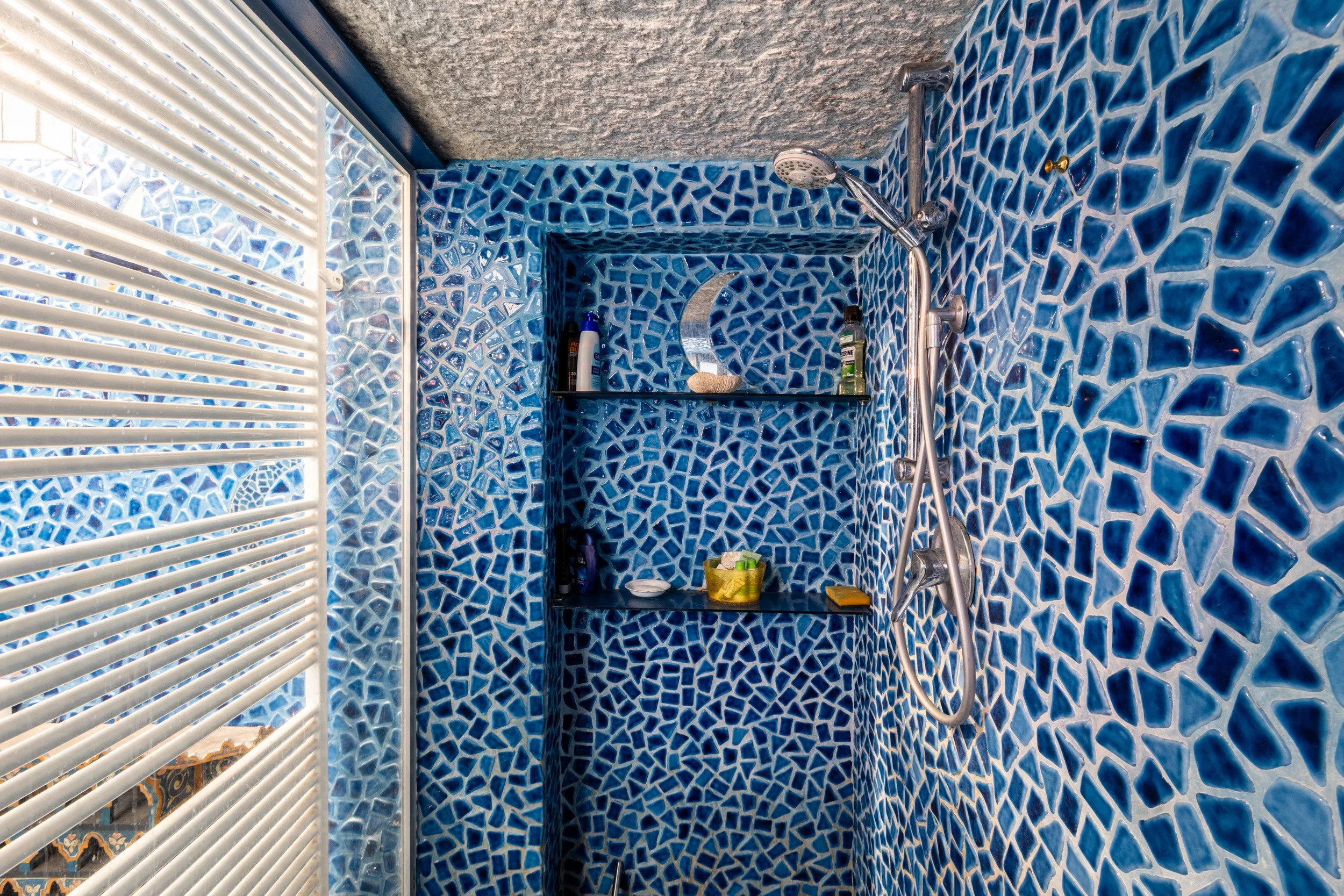 servizio-real-estate-doccia-mosaico-varese.jpg