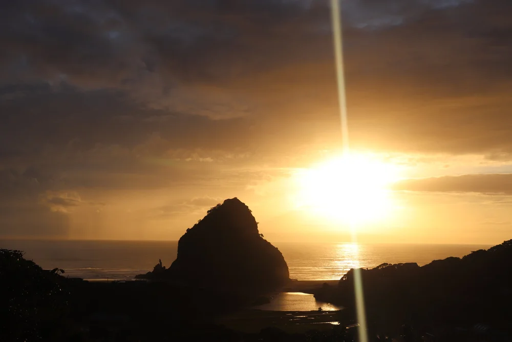 Sunset behind Lion Rock