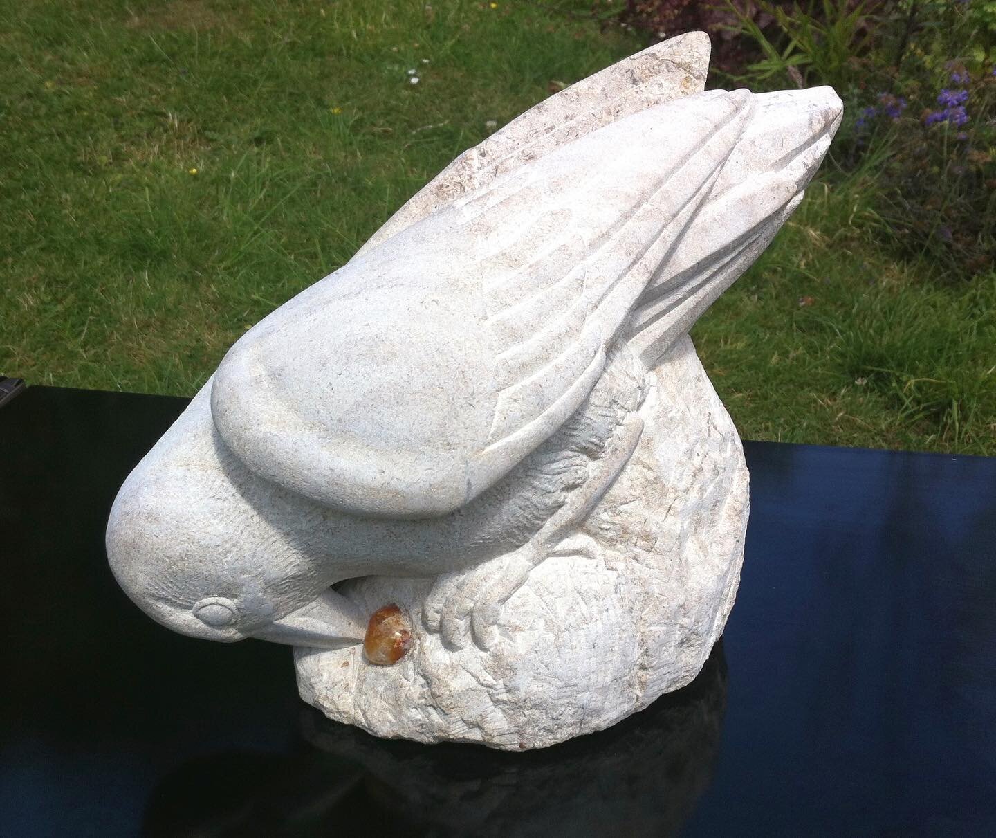 Bird with precious stone -I carved a whole ago from a piece of rough old limestone taken from a bin of &lsquo;rockery stone&rsquo; at a garden centre -&pound;5 quid
