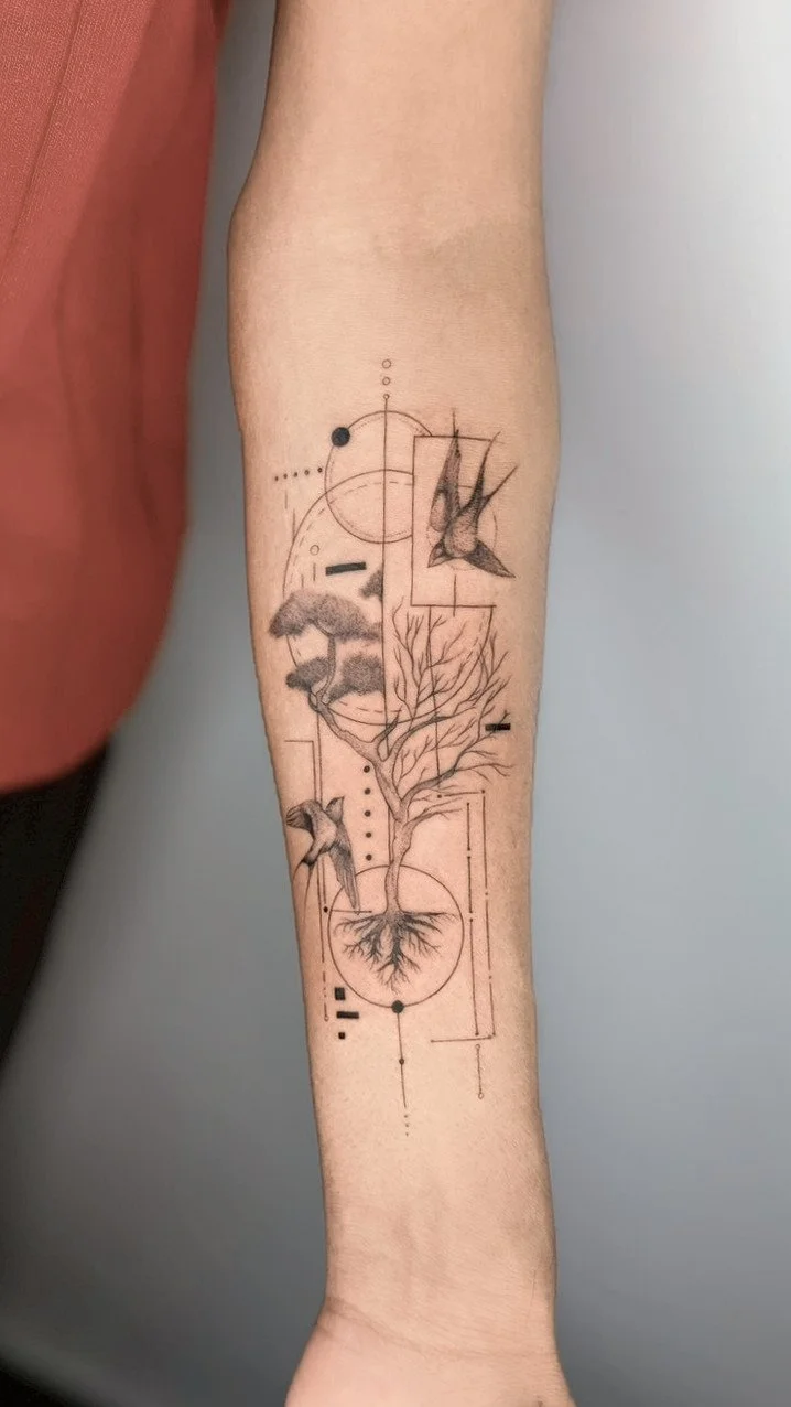 Tattoo of a tree with branches and roots, surrounded by geometric shapes and two flying birds.