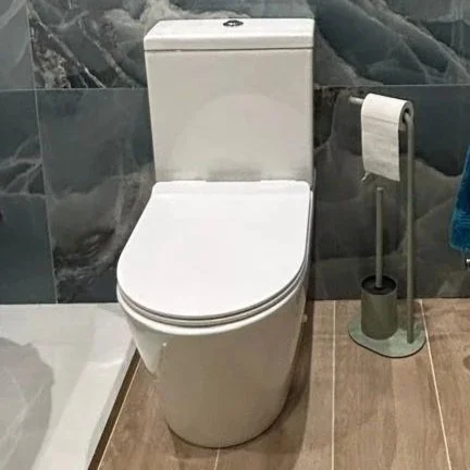 Compact toilet with ribbing from Bathroom Mountain