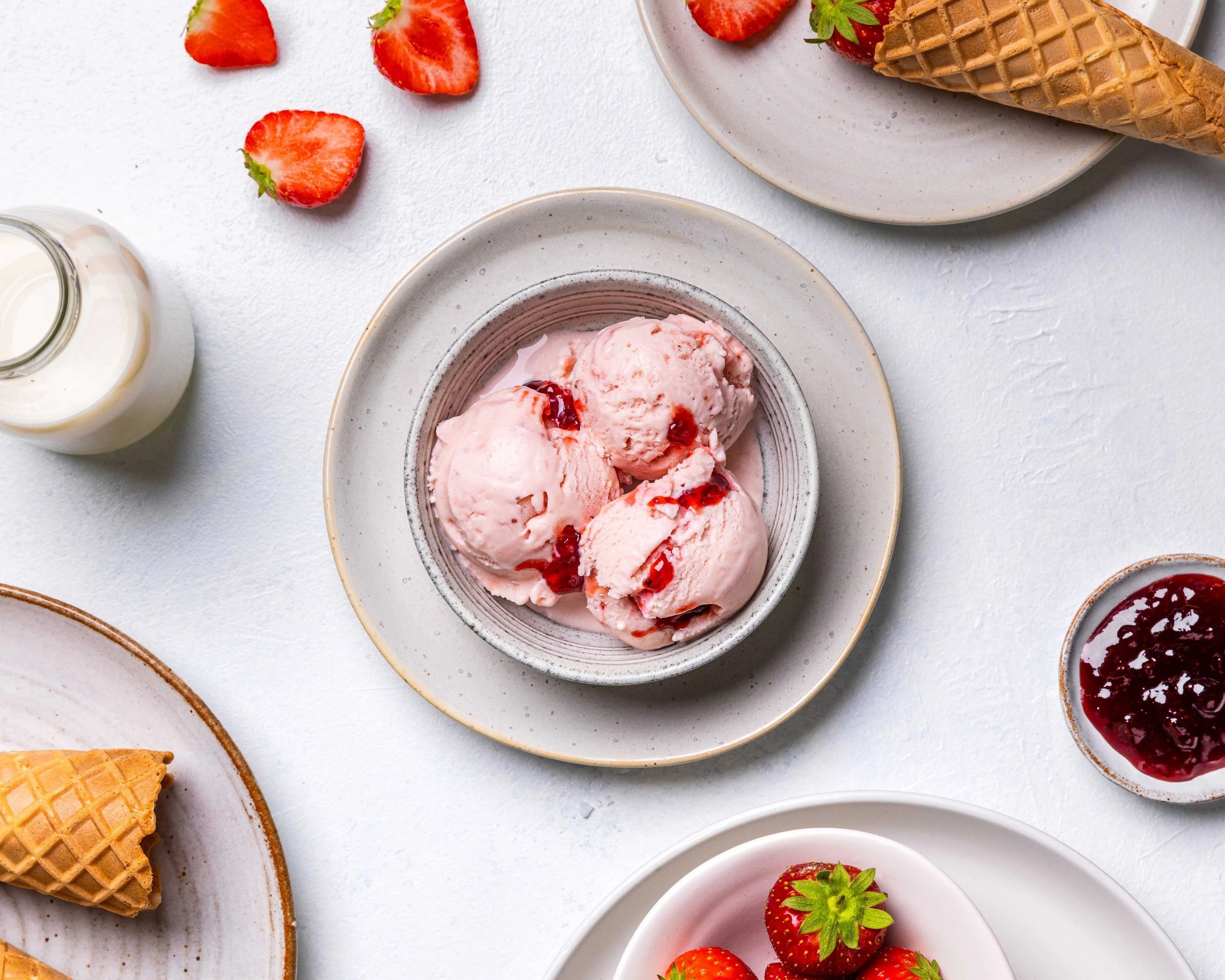 Scoops of artisan ice cream in a bowl, made in London for wholesale supply to restaurants, hotels, cafes and brand events.