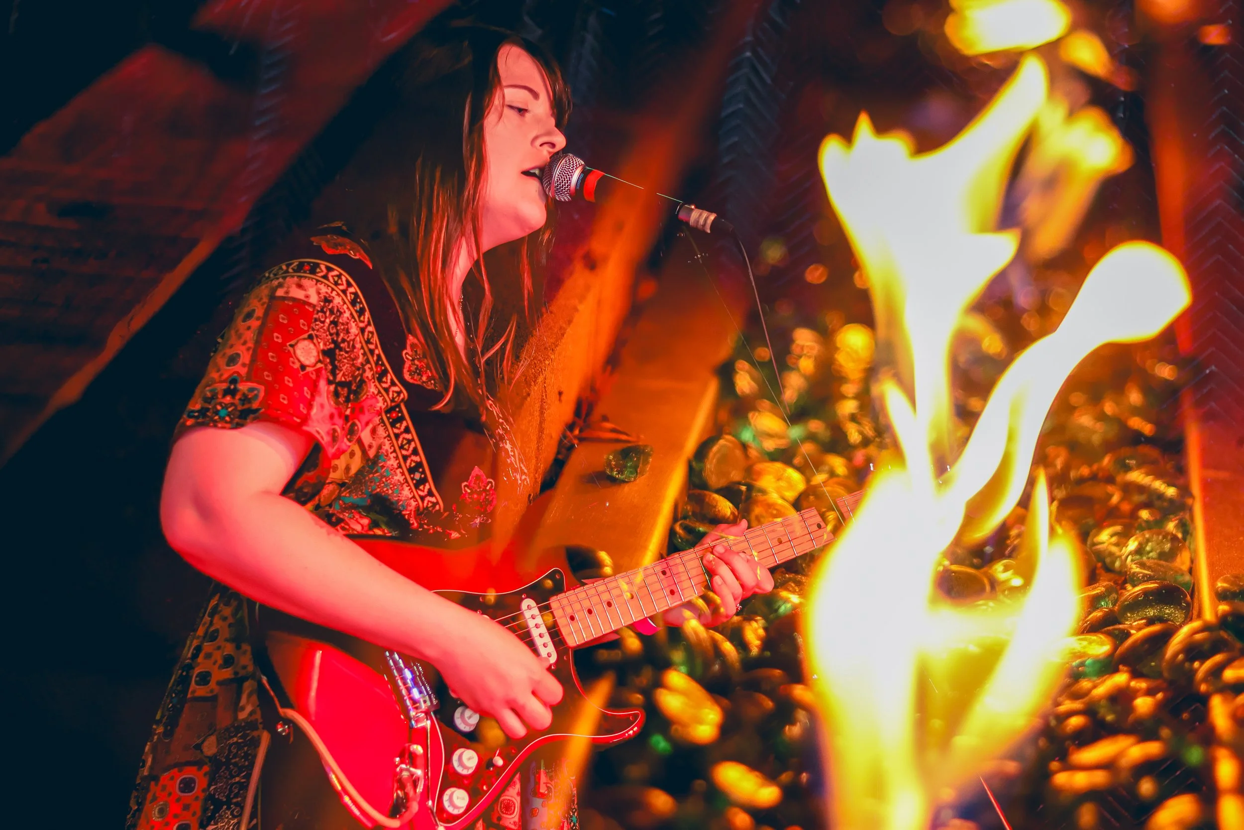 Kendra and her red Stratocaster at Enchanted Mayhem Music Festival