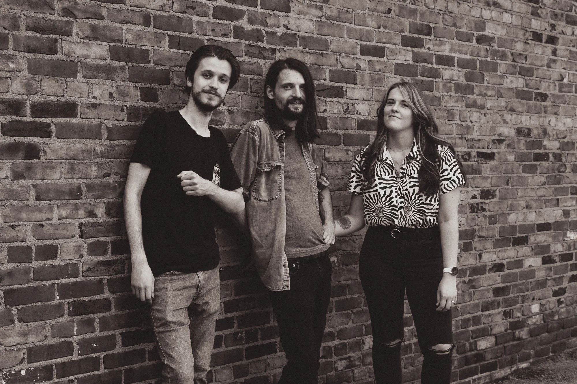 Villa Mure Band Photo against brick wall in New Albany, IN