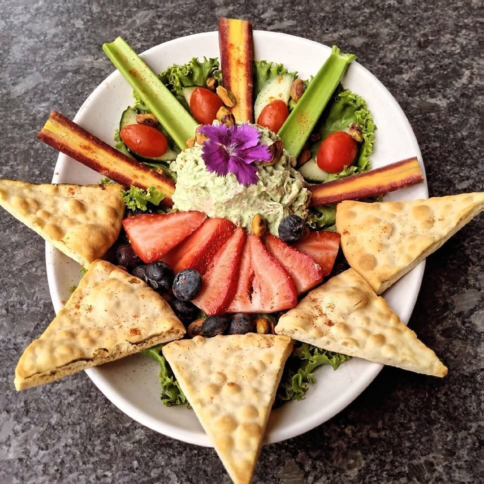 Lunch Special Alert ✨ Chicken Salad Plate 

Fresh Chicken Salad w/ carrot, celery, cucumber, tomato, blueberries, strawberry, and pistachios served with toasted pita bread.