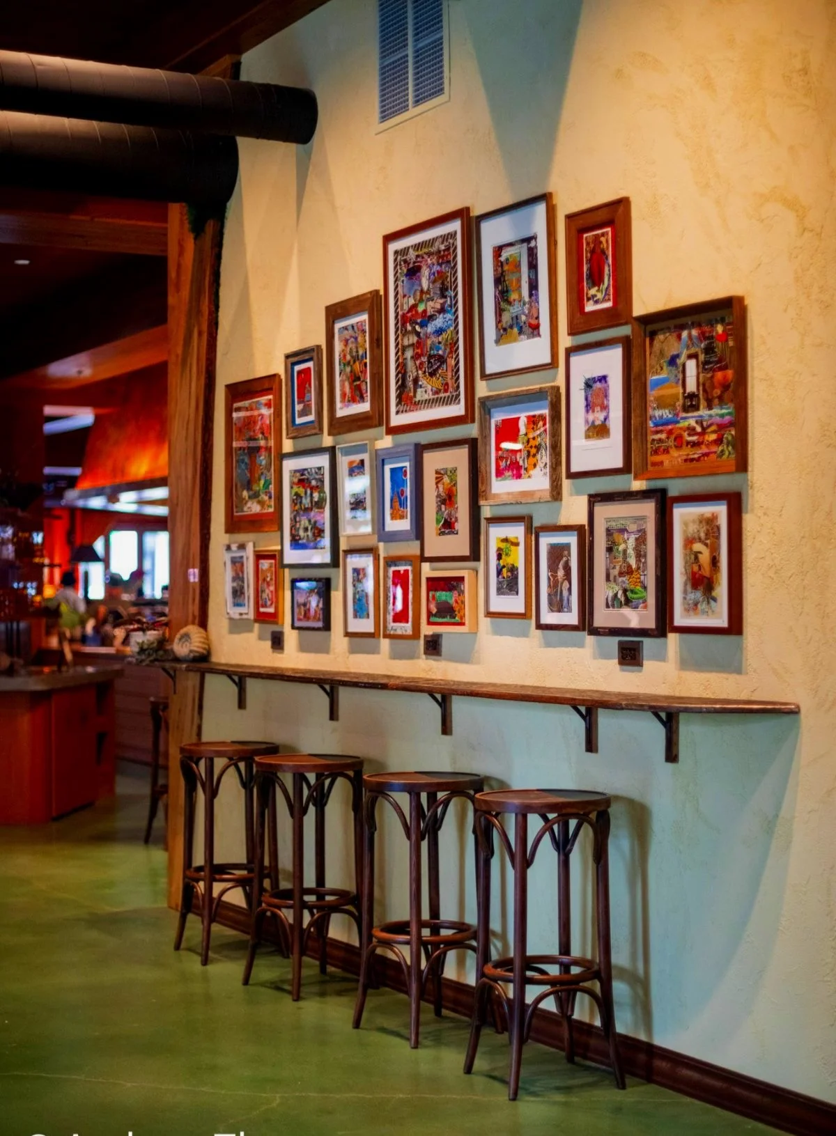 Copper espresso bar with art collage