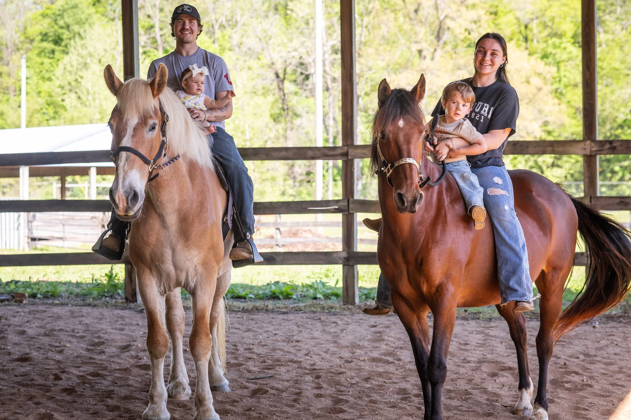 A young family and their horses