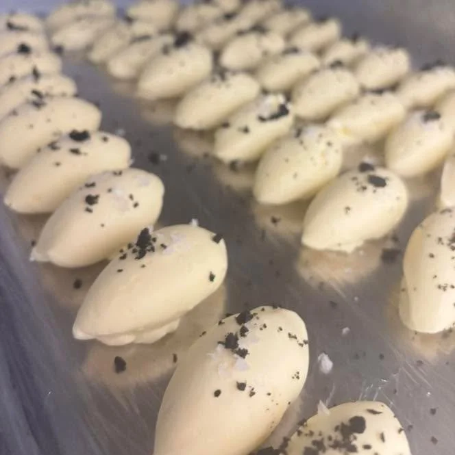 Beautiful black olive and sea salt whipped butter🤤 unbeatable with some crusty bread to elevate your starter!🥖