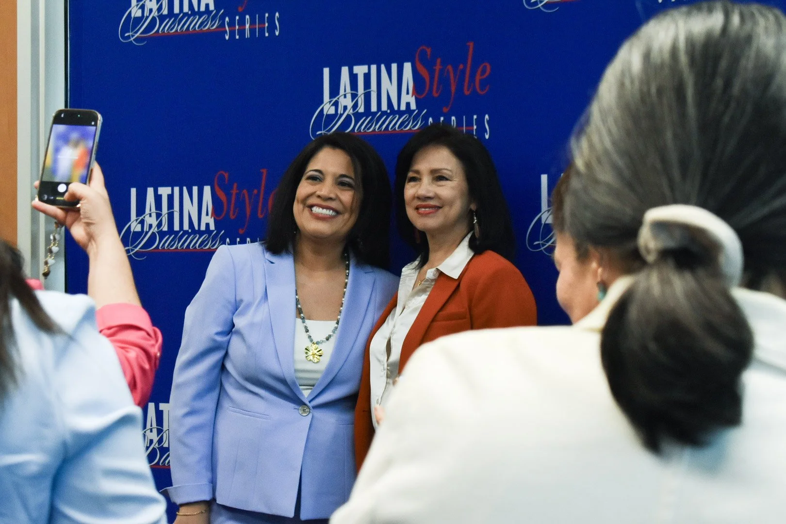 Leonor Clavijo, Morning MC, with Maria C. Garza.jpg