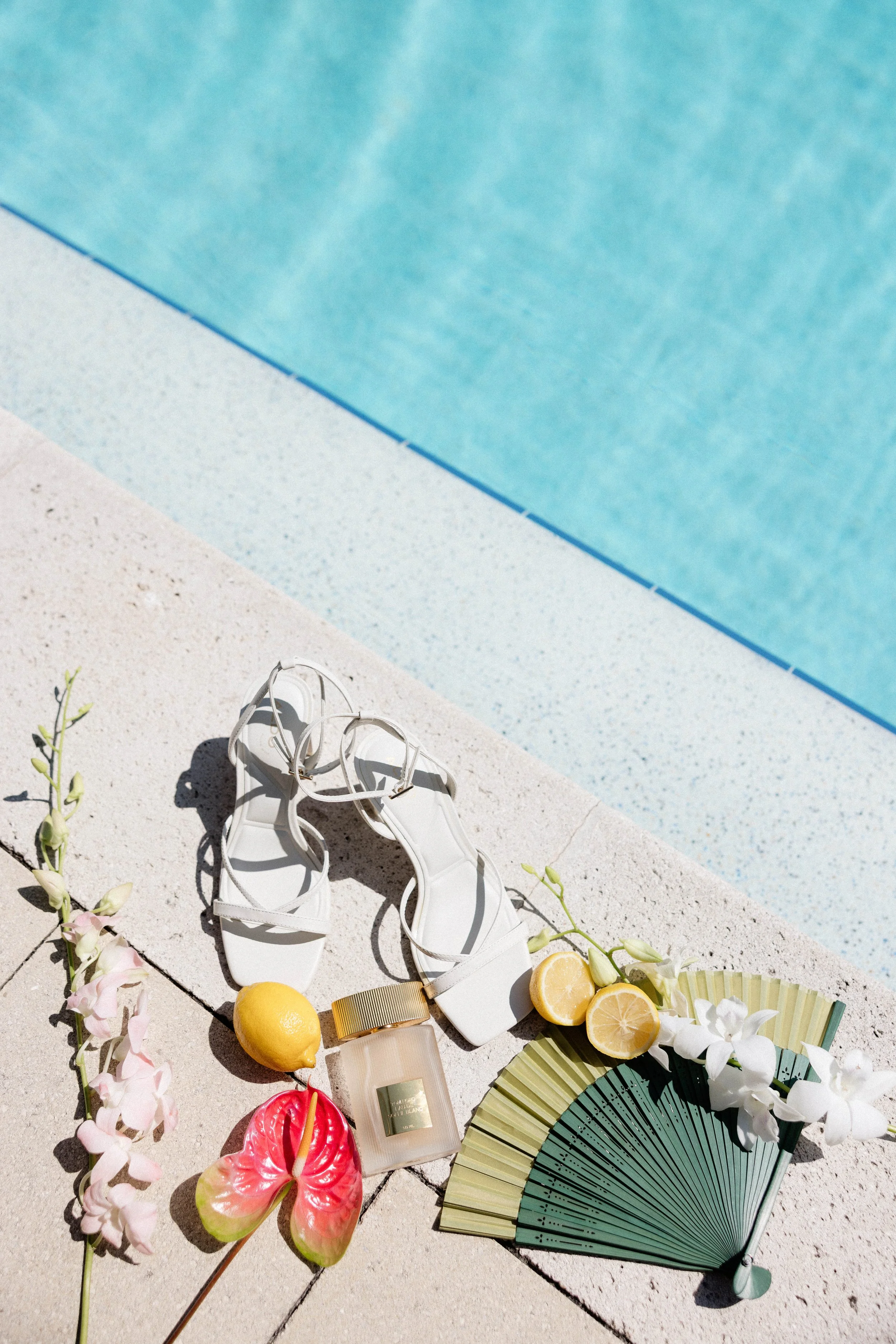 Brides details poolside by Tampa wedding photographer