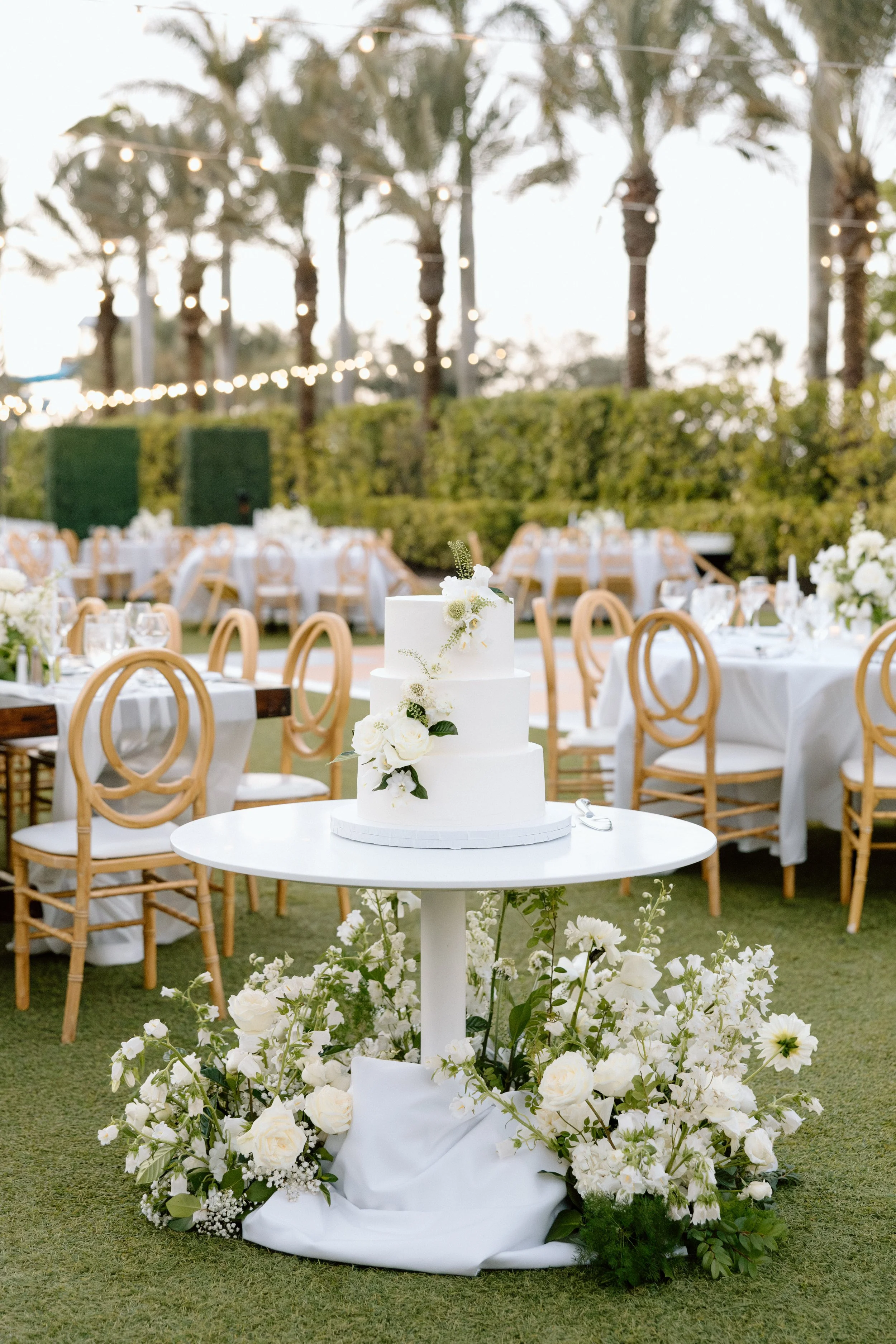 Wedding cake and reception setup at Hyatt Regency Coconut Point Resort and Spa by Naples wedding photographer