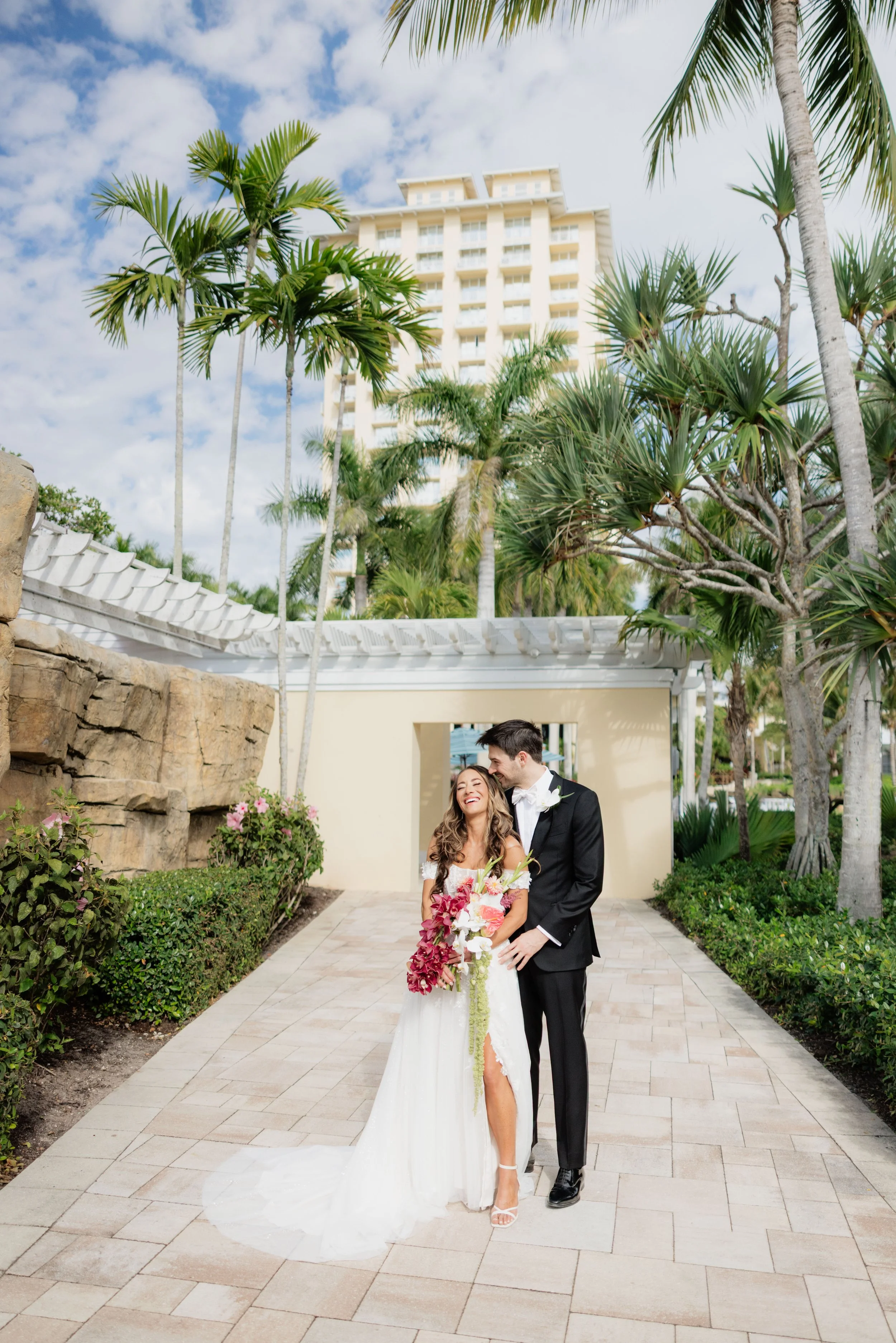 Candid bride and groom portrait at the Hyatt Regency Coconut Point Resort and Spa by Naples Wedding Photographer
