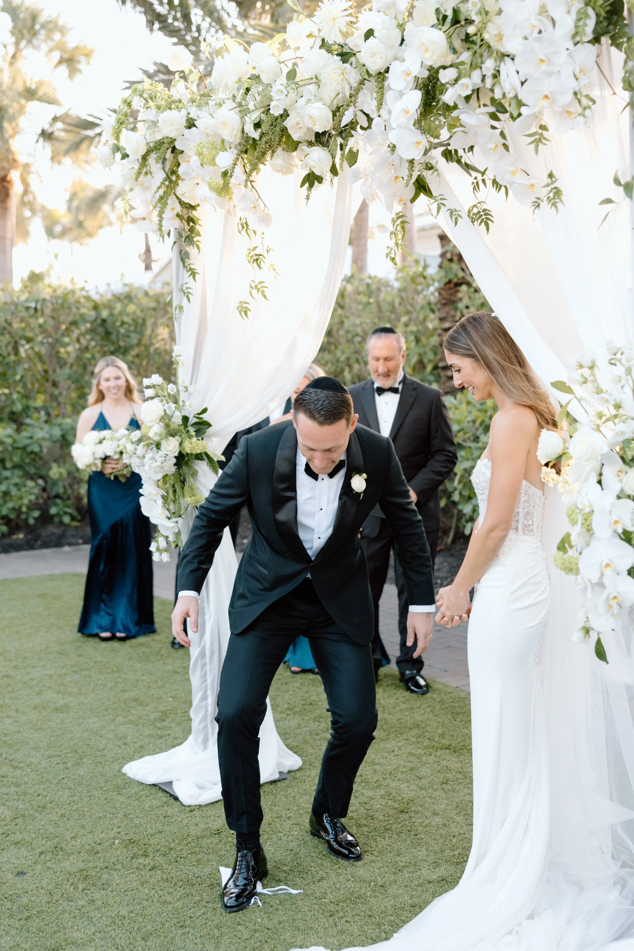 Breaking of the glass at Jewish wedding at Hyatt Regency Coconut Point Resort and Spa by Naples wedding photographer