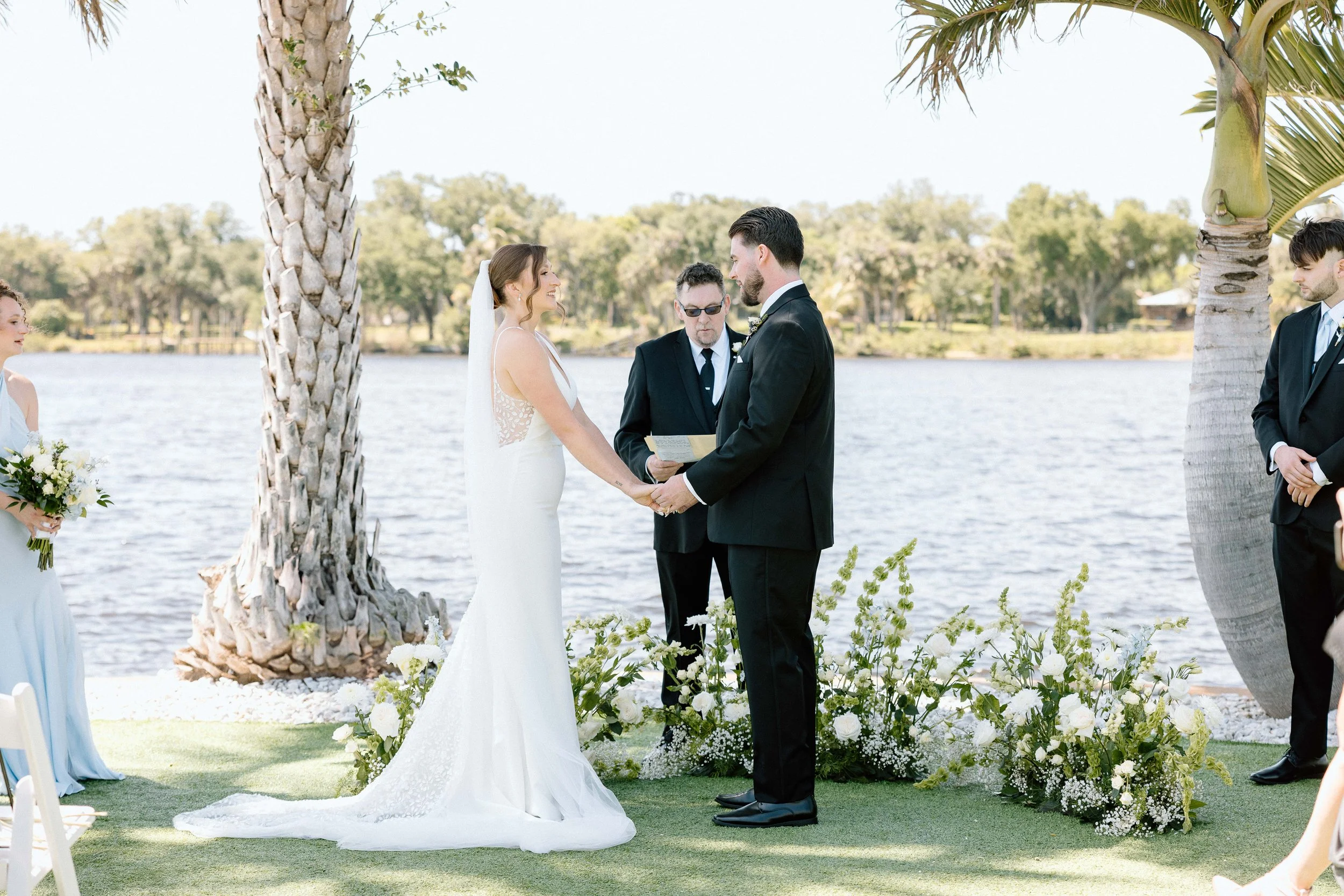 Bride and groom at wedding ceremony at Grace River Island Resort by wedding photographer Fort Myers