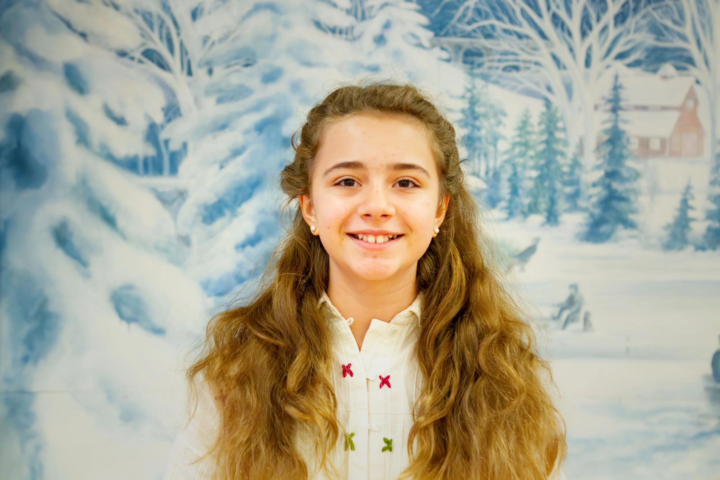 Headshot of Alexia Long, who plays Lucy in the red cast.
