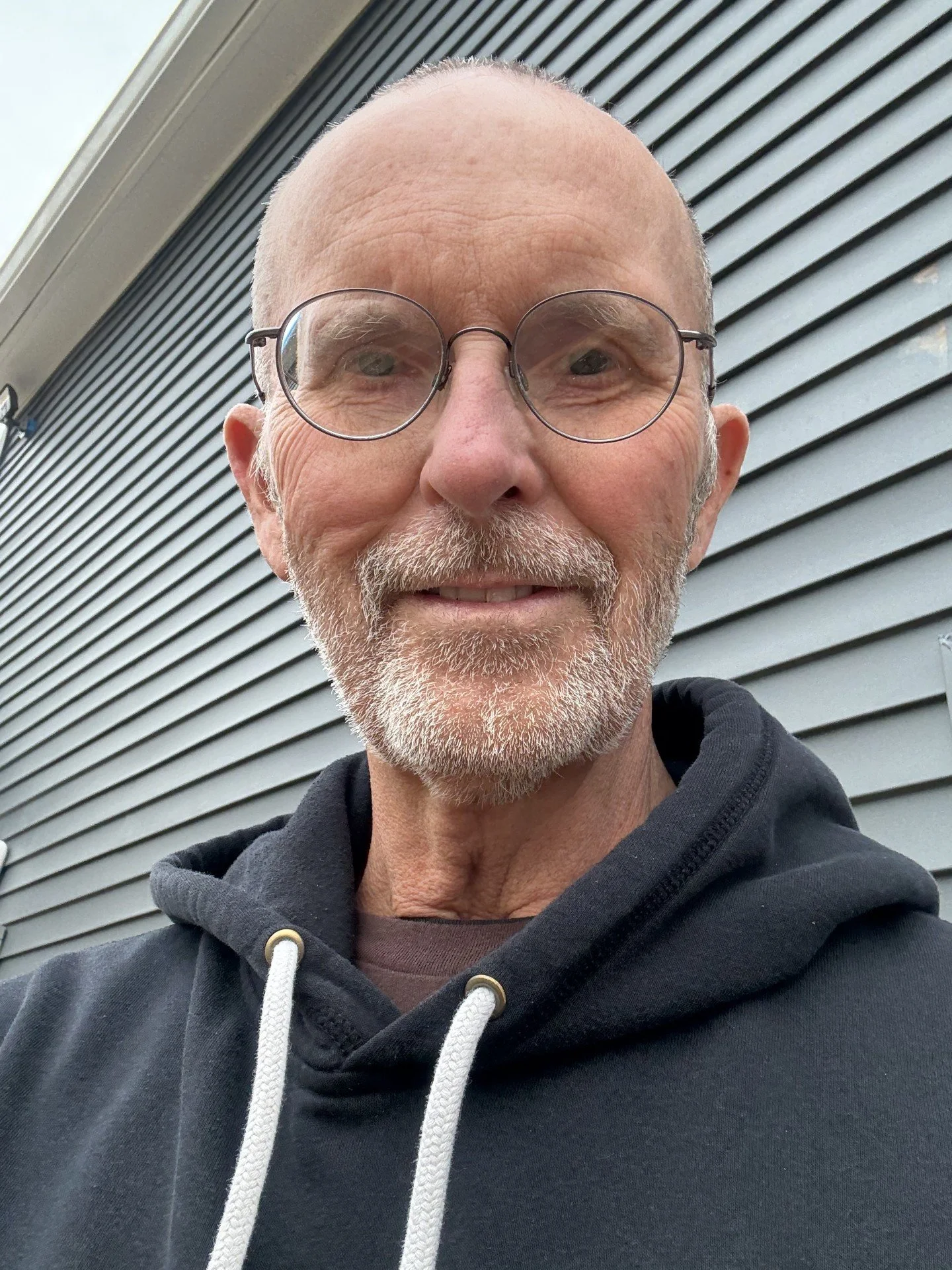 Dr. William V. Hudon, a white man in wireframe glasses.