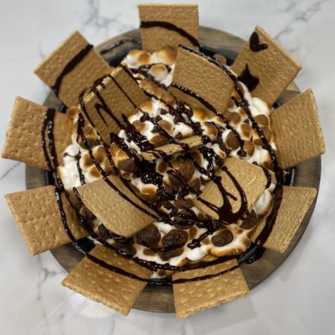 🔥🍫 Unleash your sweet tooth with Pryor's Pizza Kitchen's sensational S'mores Skillet! 🍫🔥

Why wait for a camping trip to enjoy the magic of s'mores? Dive into our deconstructed s'mores skillet and experience the irresistible blend of gooey marshm