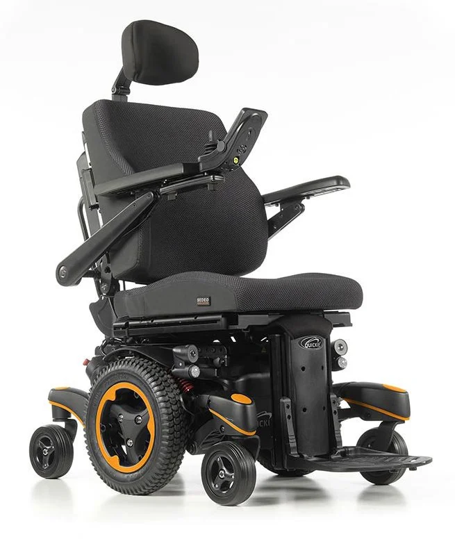 Electric wheelchair with black seating and orange accents on wheels.