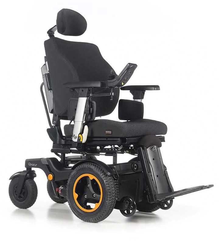 Black modern electric wheelchair with headrest and armrests on a white background.