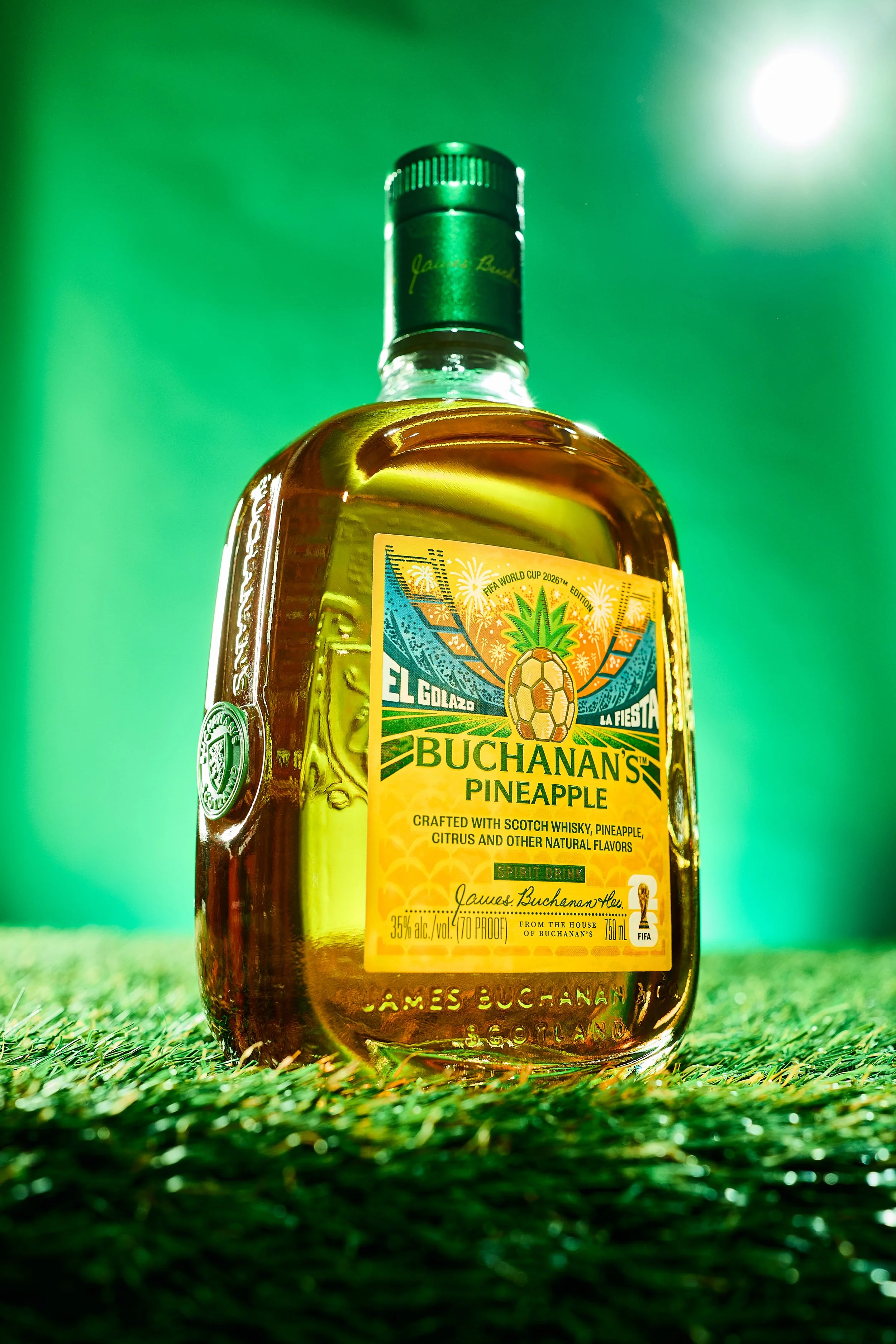 Buchanan's First-of-Its-Kind FIFA World Cup 26™ Spirit Collection Designed by Kids of Immigrants - Buchanan's Pineapple bottle representing 'El Golazo | La Fiesta' .jpg