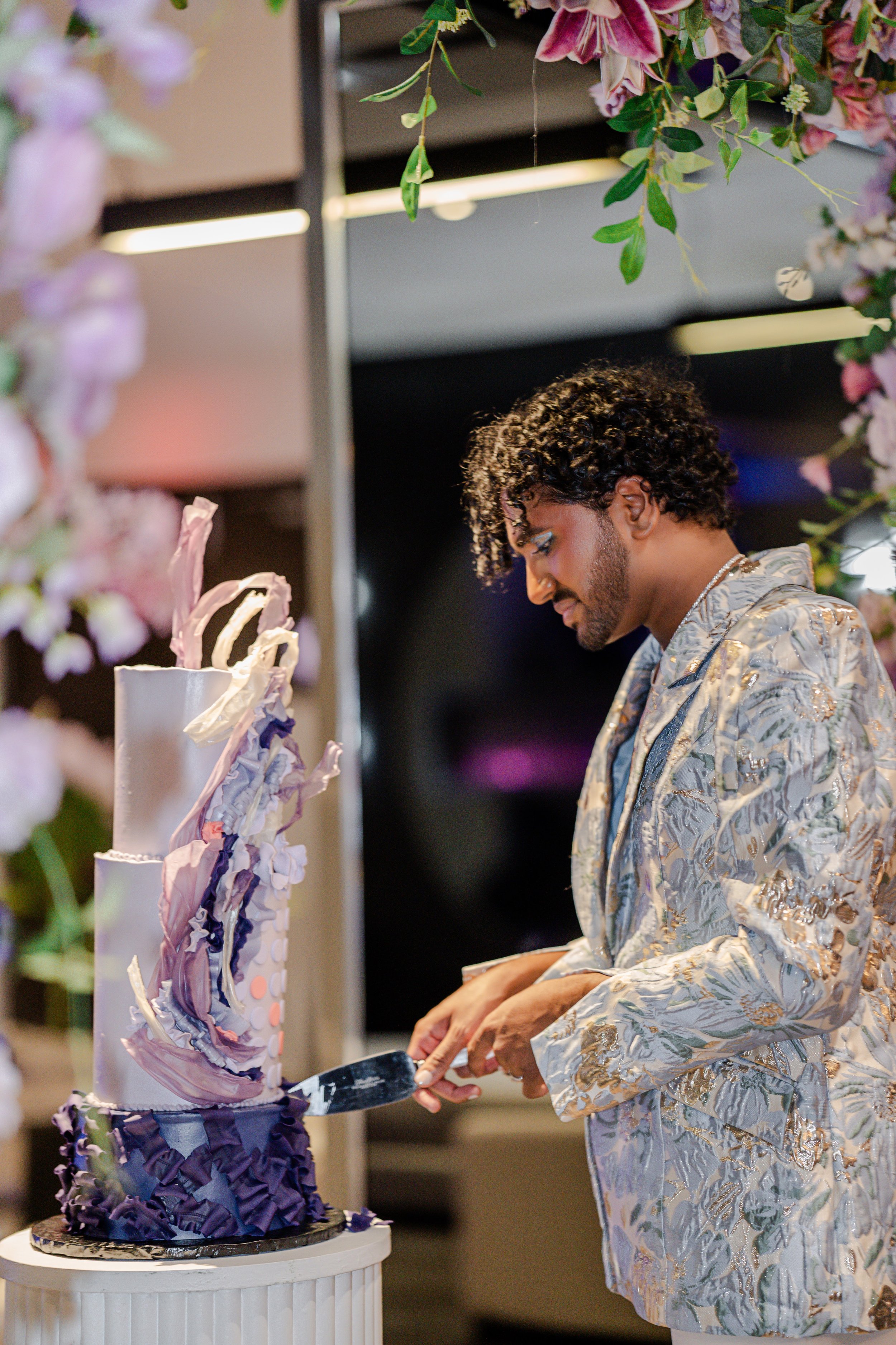 Cake cutting moment during luxury celebration event, photographed by Toronto and Ontario event photographer Lara Grace Creative Studio